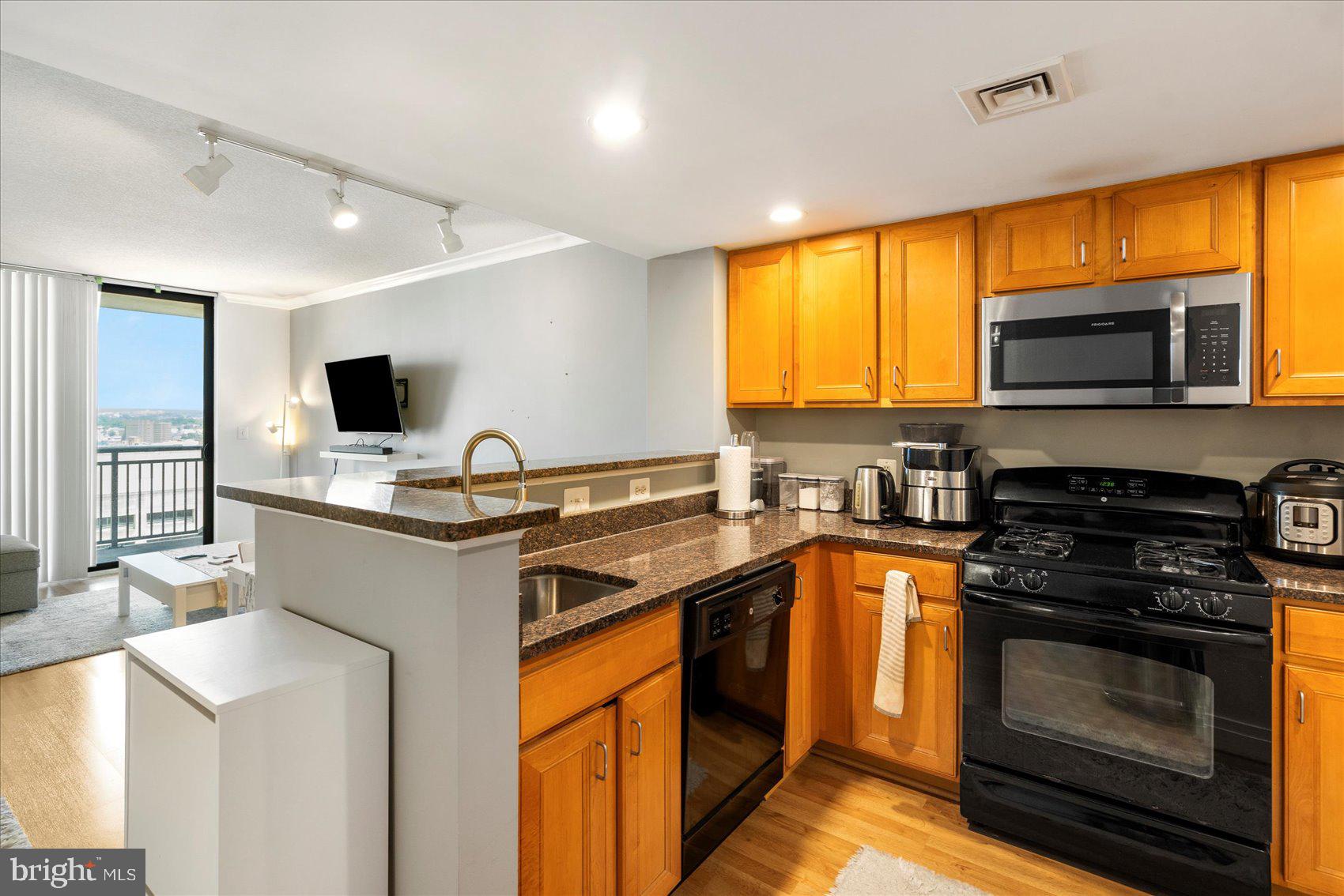 Welcome to your FUTURE. WATER STREET CONDOMINIUMS!! Downtown Baltimore Living with Luxurious Amenities. Embrace the lifestyle of luxury at one of the premier FULL SERVICE condo communities in vibrant Downtown Baltimore. Walk to everything Baltimore has to offer. Centrally located in the Inner Harbor, a short distance from the attractions of Harbor East, Camden Yards, Ravens stadium and the best restaurants in the city. Enjoy this spacious light-filled 1-bedroom, 1-bathroom condo with breathtaking views. Bring your finishing touching and add to this awesome space which includes updated luxury floors, new appliances, granite countertops and a balcony with picturesque views. Your new home will have all the amenities you need: a pool, gym with 24 access, business center/meeting room, community room, 24-hour concierge service and security, package room, and a modern lobby. Let’s start the next phase of your life TODAY! I HAVE ACCESS TO A LENDER THAT CAN LEND IN THE BUILDING!! CALL WITH QUESTIONS TO DISCUSS. $$$ WHY RENT WHEN OWNING IS SOOO MUCH CHEAPER!!!