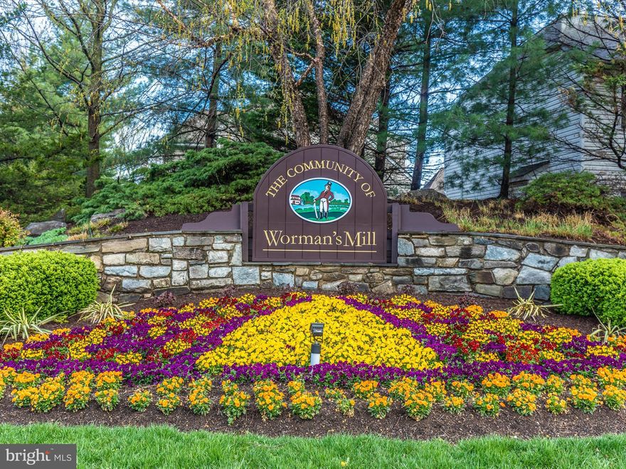 RARELY AVAILABLE 3 Bedroom, 2 Full, 1 Half Bath Park Place Condo in highly desirable, award winning Worman’s Mill.  

Facing Tuscarora Creek with its morning light, this second-floor condo features a proper foyer with coat closet and powder room; foyer opens to the main rooms with glamorous tray ceilings, a 3-sided fireplace and a formal dining area, all with recently installed LVP flooring and elegantly accented with columns and arched openings.  Recently installed remote controlled blinds over doors to balcony. Eat-in kitchen with large pantry. Primary suite with spacious walk-in closet with organizers and a commodious bath with a soaking tub, separate shower and of course a double vanity; primary suite has complete privacy from secondary/guest bedrooms (office/den) and laundry area. Secondary bedroom built-in bookcases convey. 1 year Home Warranty included. Condo includes a deeded parking space in the below-grade garage and a separate, private storage area. The secure-access building is stylish decorated and immaculately maintained, offering single-level living in a luxury elevator building with lush Victorian gardens with fountains, all just two blocks away from the charming town square. 

Worman's Mill is a planned country club community and a small town combined, with sidewalks and walking paths with gorgeously landscaped community parks, fountains and water features. The award winning walkable neotraditional design features a village square with shopping, restaurants, small businesses, financials services, farmers market and community activities, plus a park with a pavilion with music and dancing! Don’t want to walk? Plus bus service! Easily accessible are the clubhouse (with fitness center, pool, card rooms, and library), tennis courts, basketball courts, pickleball courts, playgrounds, as well as trails to the scenic Monocacy River. All this without ever leaving the community! But if you do leave the community, you are minutes to gourmet grocery stores, major retail, medical facilities, and downtown historic Frederick. Easy commuter routes to DC, Montgomery County, NOVA and Baltimore.