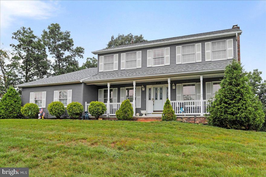 Welcome to this stunning 2-story Colonial home located in the highly sought-after Windover Hills Subdivision. Boasting over 3,000 square feet of beautifully maintained living space, this home combines classic charm with modern updates, offering comfort, functionality, and timeless elegance.
Featuring 4 spacious bedrooms and 2.5 baths, this home has been lovingly cared for and thoughtfully updated. Step into the grand front entry that exudes traditional style and sophistication, setting the tone for the rest of the home. The heart of the home is the updated kitchen, a chef’s dream with durable Corian countertops, stainless steel appliances, ceramic tile flooring, and an oversized island perfect for entertaining or everyday use. The kitchen flows seamlessly into the bright breakfast area and cozy family room, complete with a brick fireplace and French doors leading to an enclosed patio and outdoor deck—ideal for year-round enjoyment. For those who appreciate a traditional layout, this home offers a formal dining room and formal living room, perfect for hosting guests and family events. Beautiful wood flooring  flows throughout the main level of the home.  Upstairs, you'll find three generously sized bedrooms, a full bath, and a primary suite that truly impresses. The massive primary bedroom includes a luxurious private bathroom with a soaking tub, walk-in shower, oversized vanity, and a large walk-in closet. Every room of the home is filled with natural light from large windows, creating an atmosphere that feels open, fresh, and inviting. The fully finished basement offers an additional 5th bedroom and full bath, living room and woodstove, and exterior access, ideal for guests or easily convertible into a private in-law suite.  There’s also a workshop area and an expansive storage room that seems to go on forever—perfect for hobbies, tools, and more. Additional features include an oversized 2-car garage with built-in cabinets and extra storage, a separate laundry room, and two outdoor storage sheds, all proudly perched on a beautiful, partially wooded lot offering privacy and peacefulness. This one-of-a-kind property in Windover Hills is truly a must-see—combining classic elegance, functional space, and modern convenience in one spectacular package. Don’t miss your chance to make this house your forever home!