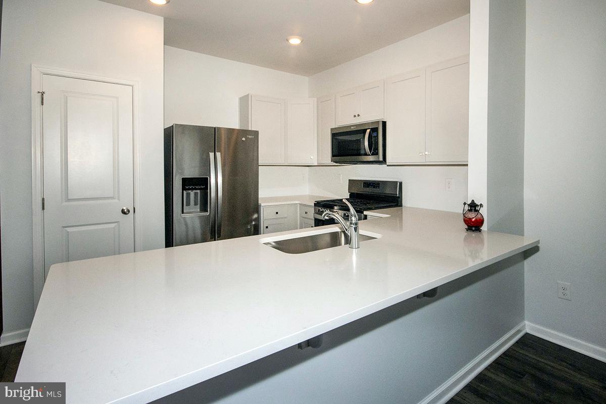 THE CARRIAGE HOMES AT SICKLER COURT - Residential