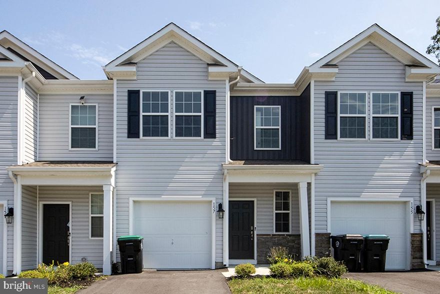 Immediate occupancy available! Balance of 10-year new home warranty included! This beautiful, one-year-old residence features 3 bedrooms and 2.5 bathrooms, attached garage, and blends modern amenities with stylish finishes. According to the Builder, you can fence in the backyard. As you enter, you'll be greeted by a family room and dining area with elegant laminate flooring the flows throughout the main floor which creates a warm and inviting atmosphere. The heart of the home is the open floor plan and a contemporary kitchen, equipped with stainless steel appliances and sleek quartz countertops—perfect for preparing meals or entertaining guests. Natural light pours into the space, enhancing its bright and airy feel. Enjoy private outdoor moments on the back patio, ideal for your morning coffee or evening relaxation. Upstairs, the master bedroom offers a spacious walk-in closet, newer carpeting, hookup for ceiling fan and the on suite full bathroom has dual sinks and a shower stall. Two other generously sized bedrooms on this floor also feature carpeting, and ample closet space. For added convenience, the washer and dryer are included and located on the second level. Situated near highways, restaurants, and shopping, this home combines comfort with convenience. This property qualifies for the NeighborFirst loan. 
Only 3% down, waived mortgage insurance, rate will be 1% lower than the market rate, plus a possible $6,000 lender credit. Call for details.