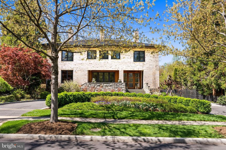 Tucked away on a private cul-de-sac in the coveted Forest Hills neighborhood, 2845 Chesterfield Place NW is a distinguished residence custom built in 2004 by renowned builder Jim Gibson, offering over 10,350 square feet of refined living on a beautifully sited level 0.37-acre lot.

Designed for both grand entertaining and everyday living, the Main Level showcases soaring 10'5" ceilings and an exceptional open floor plan. A spacious chef’s kitchen with large island, two sinks, two dishwashers, and premier appliances flows seamlessly into the breakfast room with custom bar, and expansive family room - all opening directly to the rear terrace, creating effortless indoor-outdoor connectivity. The fully outfitted outdoor living spaces include a flat rear garden, elegant patio, swimming pool with integrated hot tub, and a separate pool house complete with full bath and changing room. A Sonos indoor and outdoor sound system enhances the home’s modern lifestyle appeal. A 600-bottle wine display, dining room, office, and formal living room complete the main level of the house. 

The Second Level features four generous bedroom suites, along with an additional library or optional fifth bedroom. The luxurious owner’s suite is a true retreat, highlighted by cathedral ceilings, a spa-inspired bath with soaking tub and steam shower, and a newly renovated wardrobe room with custom closet built-ins.

The top level offers a versatile recreation space, ideal for a playroom, lounge, or additional office. The fully finished lower level is designed for ultimate comfort and flexibility, featuring an in-law suite with kitchen, home theater, exercise room, full bath, and access to a tranquil zen garden. The front and rear gardens feature mature trees, and lush vegetation, all designed by landscape architect Thomas Tait. 

Additional highlights include a front crescent driveway, three-car side loading garage with additional driveway parking and a potential elevator shaft spanning the main, upper, and lower levels. This exceptional residence presents a rare opportunity to own a private, resort-style estate in one of Northwest Washington’s most sought-after enclaves.