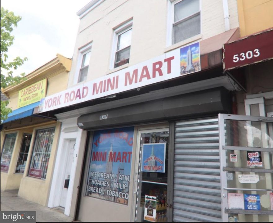 ±1,800 SF mixed-use commercial building on high-traffic York Road in the Govans area. First-floor retail space formerly operated as a carry-out/convenience store and includes existing improvements such as a stainless steel sink, reach-in coolers, a glass security enclosure, and related equipment. The basement provides additional storage (not included in SF). Upper-level two-bedroom, two-level residential apartment with private entrance and meter.  Income-producing opportunity with multiple leasing options: retail space at $1,600/month, apartment at $1,200/month, or lease the entire building for $2,500/month. Property is also available for sale at $225,000. Ideal for owner-user or investor.
