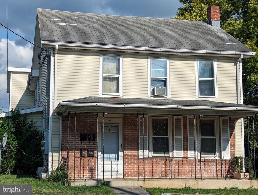 Great 4 unit investment property.  Property has 2, 1 bedroom units and 2, 2 bedroom units currently occupied. Parking lot for tenants in the rear of the home. Convenient location