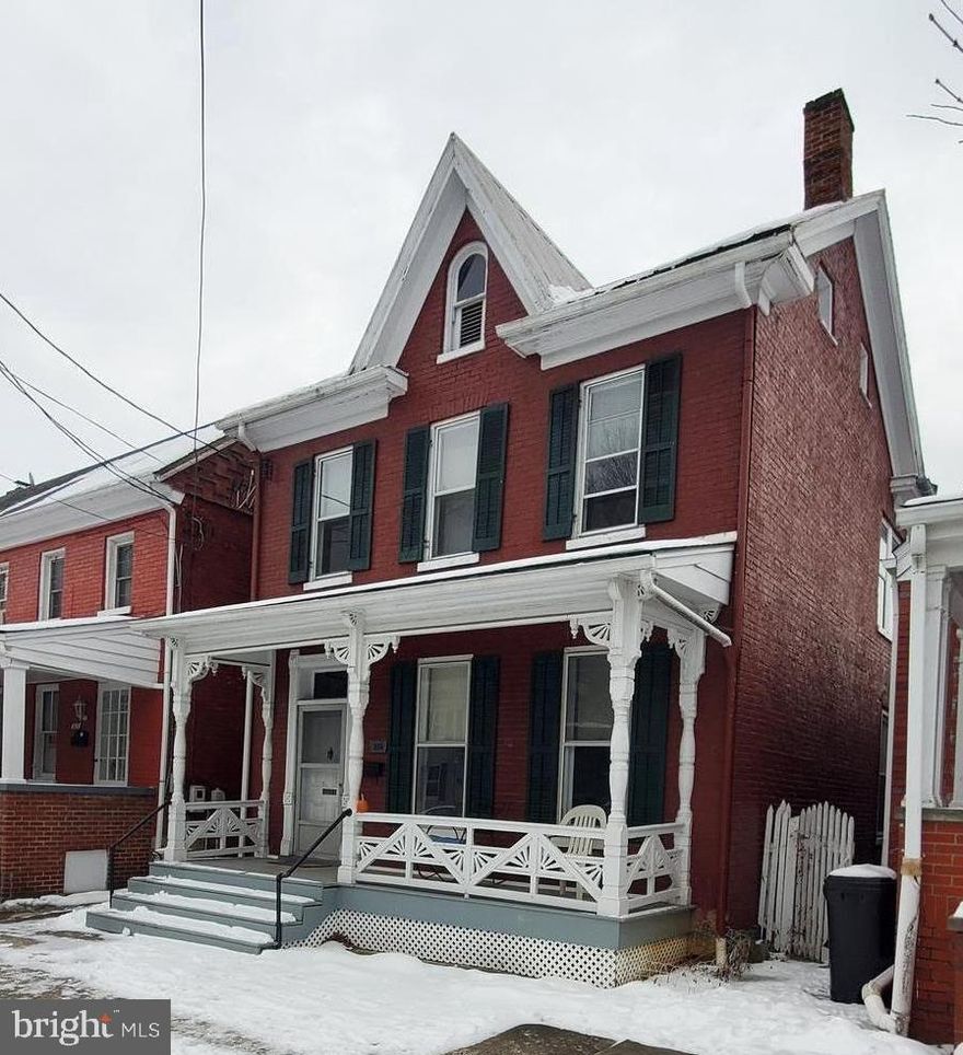 Located within the Downtown Historic District - This Brick Colonial is just walking distance to Amtrak, Library, Restaurants, Entertainment & Just minutes to I-81, Hospital, Schools & Shopping. This Home blends the Modern-Day Updates with the Charm, Character, & Warmth !!!  Over 2500 sq ft, this 4 Bedrooms Home offers Dual Zoned Heat Pumps (2018), Updated 200-amp Panel Box & Wiring, Hardwood Floors T/O. You will be pleasantly surprised with the 2nd Staircase which can be accessed from the Kitchen or Dining Room, Built-Ins in the Dining room, Spacious Bedrooms, & an Abundance of Closet/ Storage Space.  There is a Half Bath on the Main Level & 2 full Baths on the Upper Level, along with a Large Laundry Room.  The additional room on the main level could serve many purposes - Family room, Playroom, Art Studio, etc. - Your Choice!  Lovely Rear Yard with a detached building -could be used for a garage or storage - with Alley Access.   Current Owner has used as rental property - They have moved out of the area.  Just waiting for that "Just Right" Family.  Easy to Show !!!!!!