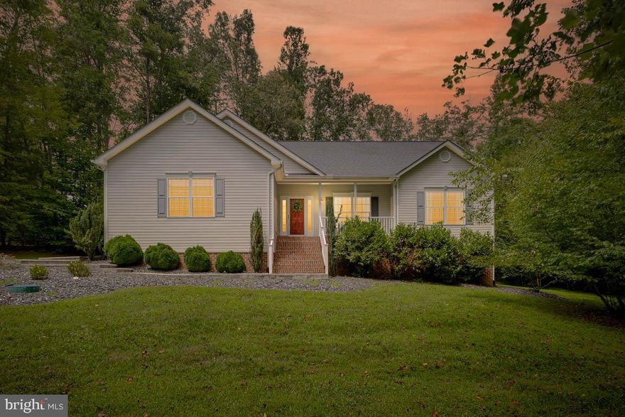 Lake Living Starts Here — Deeded Boat Slip with Lift Included!
Welcome to your perfect lake retreat in the sought-after Morgan II community at Lake Anna! Nestled on a private, level 1-acre lot just one block from the water, this beautifully maintained 3-bedroom, 2-bath rambler offers stylish one-level living plus a spacious bonus loft  — ideal for guests, an office, or a hobby space.
Inside, you’ll find a bright and open layout with gleaming hardwood floors, a generously sized family room, and a modern kitchen featuring stainless steel appliances, ample cabinetry, and a sunny breakfast area. The luxurious primary suite boasts a walk-in closet and a spa-style bath with a double vanity, soaking tub, and separate shower.
Step outside to enjoy the deck and fire pit patio, perfect for year-round entertaining under the stars. The deeded boat slip with  lift conveys, giving you effortless access to Lake Anna’s  navigable waters — bring the boat and the fun!
Additional highlights include:
Oversized 2-car garage with storage
Private well & conventional septic
HOA with low annual dues and community boat ramp, dock, and picnic area
Whether you're searching for a weekend getaway or full-time lake life, this is the ONE that checks all the boxes. Don’t miss your chance to live near the water without the waterfront price!