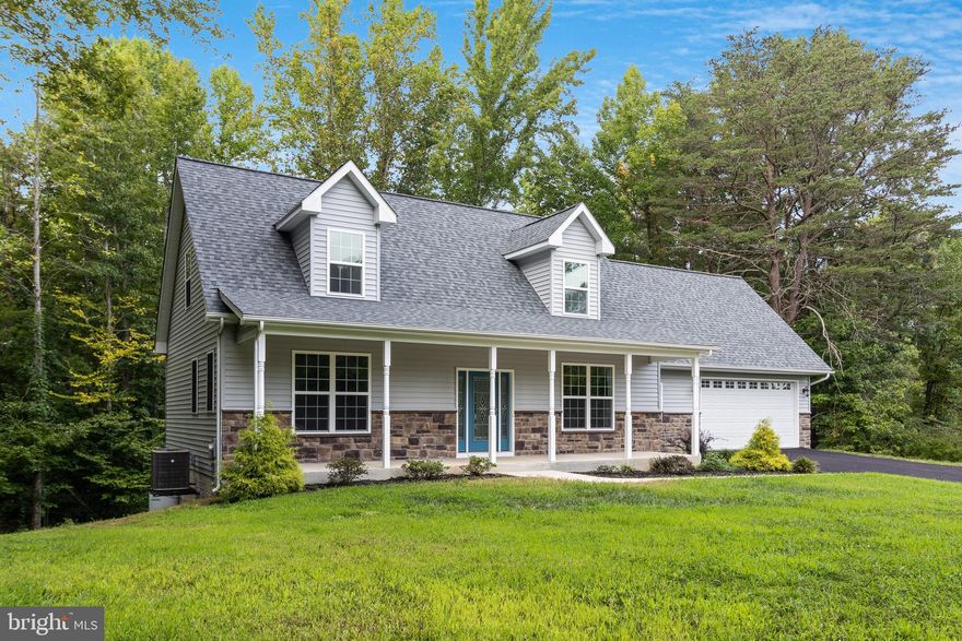 Welcome to this stunning Cape Cod home located in the serene northern Calvert area, with an open layout on a generous 2.33-acre lot. Built in 2021, this modern home offers a perfect blend of comfort and style. As you step inside, you'll be greeted by with 9' ceilings and beautiful hardwood floors in the living and kitchen areas, creating a warm and inviting atmosphere. The gourmet kitchen features granite countertops, a kitchen island, stainless steel appliances, and a gas stove. The primary suite on the first floor offers a luxurious retreat with a walk-in closet, while the primary bath is equipped with a jacuzzi tub and a walk-in shower for ultimate relaxation. Convenience is key with main level laundry and a half bath located off the kitchen for easy access. Upstairs, you'll find two large bedrooms and a full bath, perfect for family or guests. The fully finished basement adds even more living space, complete with a bedroom, full bath, office space/workout room or extra storage areas. Step outside to the backyard from the walk-out basement or enjoy the view from the 12x14 deck overlooking the expansive yard. With a 2-car garage, paved driveway, and all these amazing features, this Cape Cod home is truly a gem waiting to be discovered.