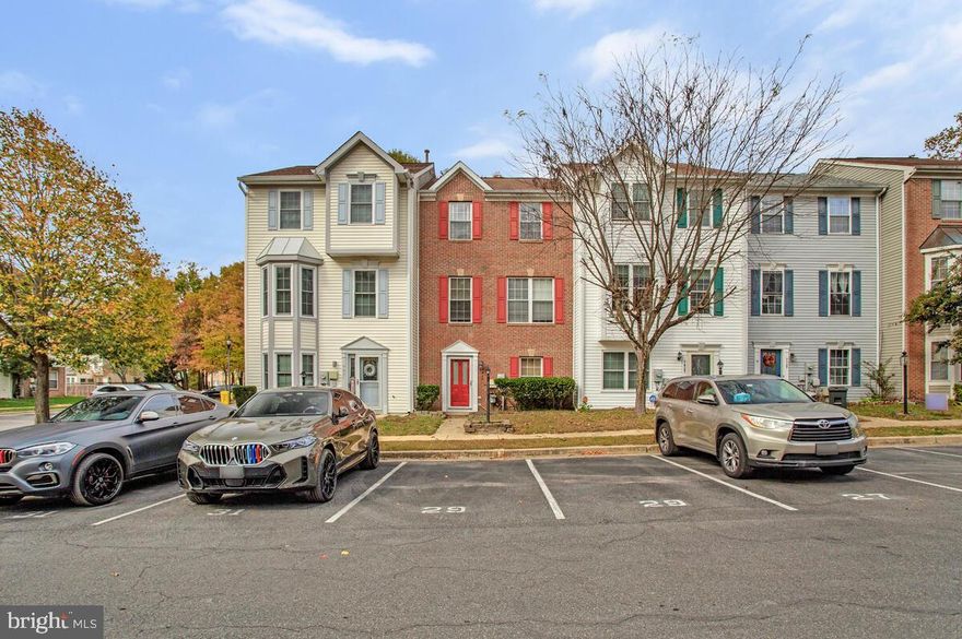 Luxury Living Meets Everyday Convenience in This Stunning Brick Townhome. Step into three levels of beautifully designed living space, where natural light pours through a thoughtfully open floorplan. From the moment you enter, the spacious foyer welcomes you into a versatile family/rec room complete with a full bath—perfect for guests, a home office, or cozy movie nights. Upstairs, gleaming hardwood floors, soaring 9’ ceilings, and recessed lighting set the stage for elegant everyday living. The updated eat-in kitchen is a chef’s delight, featuring stainless steel appliances, granite countertops, and upgraded cabinetry. Step out onto the private deck to enjoy morning coffee or evening gatherings overlooking the fenced backyard.The top level offers a serene owner’s suite with a walk-in closet and spa-inspired bath boasting an oversized shower, ceramic tile, and dual vanities. Two additional bedrooms provide generous space and share easy access to a well-appointed hall bath. Laundry is conveniently located near all bedrooms for added ease.Recent upgrades include newer carpet, HVAC, and roof—making this home truly turnkey. Located just minutes from premier shopping, dining, and major commuter routes, with quick access to Baltimore, Annapolis, D.C., and nearby military bases, this townhome blends luxury, location, and lifestyle.