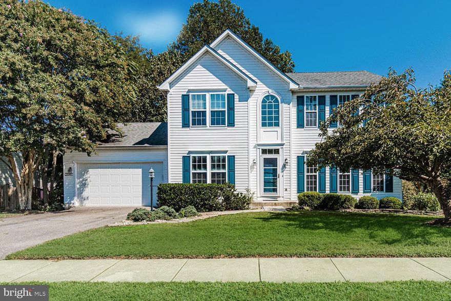 IMMEDIATE OCCUPANCY COASTAL COLONIAL!  SETTLE IN COMFORTABLY BEFORE THE UPCOMING HOLIDAYS!  Obviously loved, spacious & gracious 4-BR home in Chesapeake Beach offering a resort lifestyle with a boardwalk along the Bay.  Bask in the seasons on your treetop dining deck flanked by 2 lower paver patios backing to trees for peace & privacy!  Bring nature indoors with the home’s abundant, oversized windows.  Glossy hardwood floors & designer ceiling fan breezes throughout!  Staircase separating sizeable Living & Dining Rooms.  Rear Great Room encompassing stainless Kitchen, casual dining area spilling out to deck, and Family Room w/trendy linear fireplace; Half Bath. Vaulted upper Primary Bedroom Suite with spa-inspired Bath.  3 Additional BRs; Full Family Bath.  Expansive recreational walk-out lower level with space for Home Theater, Gym, Office, & game tables!  Multi-vehicle driveway; 2-car attached garage with Laundry. Stroll the Bay boardwalk, visit Calvert Cliffs State Park, boat on the Bay, dine at the famed Rod ‘N’ Reel resort hotel with entertainment amphitheater, and dock your boat at a nearby marina!  Convenient to RTs 261/4/2/301.  30 Minutes to Annapolis; 60 Minutes to Baltimore.  A SIMPLY MARVELOUS SOUTHERN MARYLAND HOME.