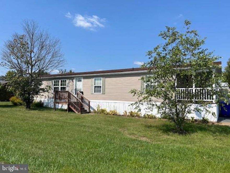 Multiple offers received. Highest and best due by Sunday 11/10/24 5pm
Welcome to Lincoln Estates- This 3 Bedroom, 2 Full Bath  Double wide mobile home is an amazing find! Over 1600 square foot and in great condition! Modern open floor plan has plenty of space for everyone. Features include eat in kitchen with breakfast bar and room for stools, spacious cozy living room with fireplace and separate dining room. Primary owners suite has a walk in closet and ensuite full bath. Updated tile shower is amazing! Two additional bedrooms with ample closet space. Unit is equipped with a wheelchair lift at end of driveway for special needs access or just to lift heavy things onto the porch. Works great for furniture and groceries as well!  Storage shed conveys- lots of room for exterior storage!! Lot includes two parking spaces and nice yard. Kitchen appliances convey with sale.  Any interested parties must have park approval.
