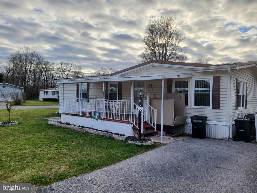 Charming and well-maintained double-wide 3 bedroom, 2 bath, ranch-style home situated on a spacious corner lot at 600 Spring Ct, Abbottstown, PA. This delightful property offers a comfortable and modern living experience with recent upgrades and thoughtful improvements to include a wheelchair lift. The kitchen boasts a brand-new stove, enhancing both the functionality and aesthetic appeal of the space. This upgrade ensures a modern and efficient cooking experience. Recent window replacements contribute to improved energy efficiency, allowing for better insulation and natural light. These upgrades enhance both the interior ambiance and overall energy conservation.  A new hot water heater has been installed. The bathroom has been updated with new flooring, adding a touch of contemporary style and ensuring a clean and welcoming atmosphere. The property features new gutters.  The front and back decks add a welcoming touch and provide a perfect spot for outdoor relaxation. The two outdoor sheds offer additional storage space, providing a practical solution for keeping tools, equipment, or seasonal items organized.