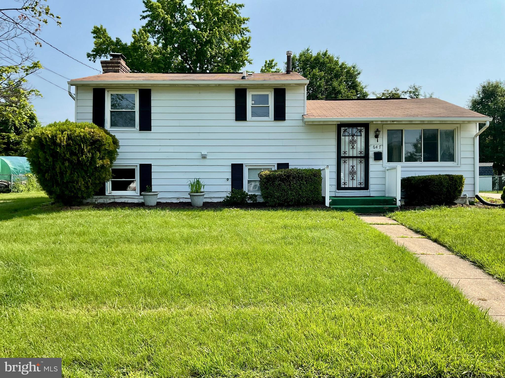 Welcome to 647 Elm Street — A Stunning Renovated Gem in Aberdeen, Maryland!
Prepare to be impressed by this beautifully transformed single-family home nestled in the heart of Aberdeen. With thoughtful renovations throughout, this move-in-ready residence combines modern functionality with timeless comfort, offering the perfect blend of space, style, and charm.
The upper-level features two generously sized bedrooms, each with new carpet, plush padding, and ceiling fans for comfort. A spacious, luxuriously updated bathroom boasts a tiled walk-in shower, and a sleek vanity designed to complement the home’s fresh color palette. The primary bedroom offers direct access to a large, refurbished rear deck—ideal for relaxing or entertaining.
Step downstairs to find a freshly painted living room adorned with upgraded luxury vinyl plank flooring, which flows seamlessly into the expansive kitchen. Outfitted with cabinets installed in 2021 and ample prep space, the kitchen opens into a delightful 159 sq. ft. sunroom—a perfect spot for morning coffee or year-round enjoyment.
The fully renovated lower level (completed in March 2025) provides versatile living options, including a third bedroom or entertainment space. This level includes a stylish second full bathroom with a tiled shower and a cozy hearth-style fireplace with side dimming lights. A separate utility room houses the washer, dryer, HVAC system, and two sump pumps for added peace of mind.
Situated on a spacious lot, the property includes a large storage shed and plenty of green space—ideal for gardening, play, or future possibilities.
Don’t miss your chance to own this thoughtfully updated home in a welcoming community of Chesapeake Acres. Schedule your private tour of 647 Elm Street today and envision the lifestyle that awaits!
An additional incentive to purchase in this community: Chesapeake Acres is located in a Federal Opportunity Zone. An Opportunity Zone is a federally designated, low‑income census tract that offers tax incentives to encourage long‑term private investment through “Opportunity Funds.” Investors can defer or reduce capital gains taxes by reinvesting in businesses or real estate located in these areas