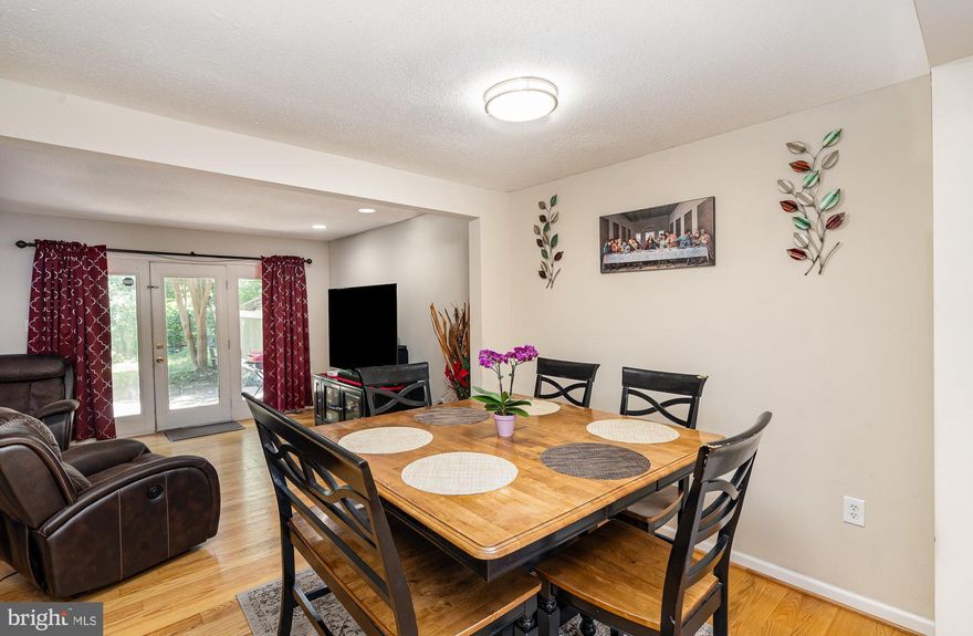 PRICE IMPROVEMENT! $20,000 BELOW appraised value!  
Welcome home!! Beautifully updated 3-bedroom, 2.5-bath townhome in Rippon Landing. Featuring hardwood floors throughout and an open-concept layout, this home blends style with functionality. The kitchen is a standout with custom 48-inch cabinets offering ample storage and a high-end touch. The private basement provides incredible flexibility—perfect for as a 4th bedroom, home gym, in-law suite, studio, or whatever suits your lifestyle. Thoughtful upgrades are found throughout, complemented by fresh landscaping and brand-new sod in the backyard—ideal for outdoor entertaining or relaxing. Conveniently located just minutes from Potomac Town Center, Potomac Mills Mall, I-95, and Route 1 for easy commuting and access to shopping, dining, and entertainment. Recently appraised at $430,000 so instant equity for you!  Come see it before it's gone!