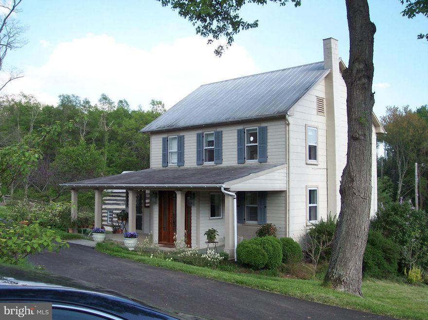 Enjoy the quiet serenity of this updated farm home.  Surround yourself with nature in this beautiful setting.  Small barn-workshop.  Stream. Back on the market with new furnace!