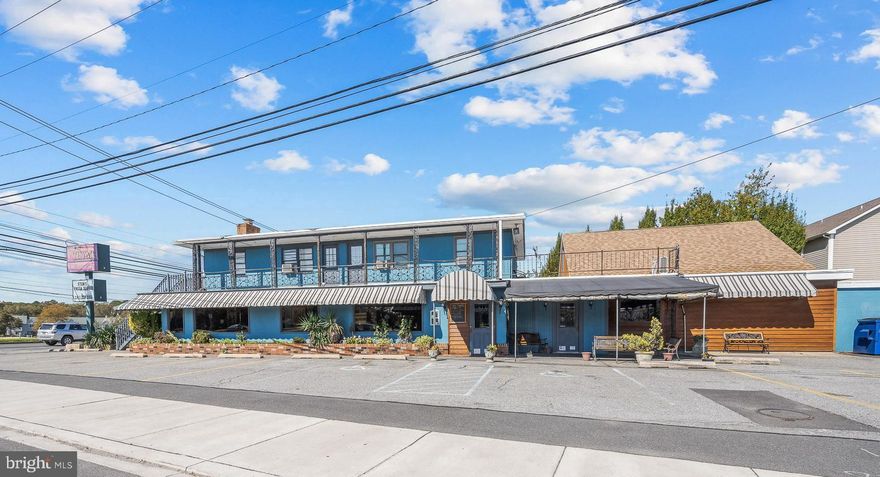 Incredible investment opportunity in the booming beach town of Rehoboth Beach, Delaware, this +/-.36-acre lot sits on two commercially zoned parcels with great development potential. The 5,600 SF building is currently used as the established and successful restaurant and bar, Just in Thyme, with two 2-bedroom apartments upstairs, both on month-to-month leases and offers parking for 38 cars.  With 61 ft of frontage on Coastal Hwy Route 1, the lot has very high visibility year-round and convenient access to both downtown Rehoboth and Dewey Beach. Perfect for an owner/user, developer, investor, or restauranteur, schedule your private tour today!