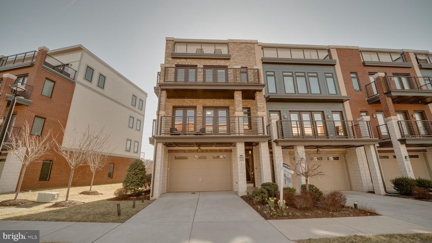 Stunning 4-Level Corner Unit Elevator Townhome with Rooftop Terrace & Backyard Backing to W&OD Trail – Prime Ashburn Location

Welcome to 20062 Old Line Terrace, a luxurious builder’s spec home designed for modern living with high-end finishes. ELEVATOR townhome that stops at every floor and an entertainer’s dream rooftop terrace. 

This rare corner unit offers extra privacy, abundant natural light, and a spacious backyard that backs directly to the W&OD Trail, providing the perfect blend of tranquility and convenience.

Built in 2018 but first occupied in 2019, this home allows you to enjoy the feel of a nearly brand-new property without the brand-new construction price tag!

The gourmet kitchen is a true showstopper, featuring sleek granite countertops, high-end stainless steel appliances, and soft-close cabinetry. Cooking enthusiasts will love the gas stove with a vent hood, built-in microwave, and double ovens, perfect for preparing meals with ease. Elegant crown molding adds a refined touch, enhancing the kitchen’s sophistication. A spacious pantry provides additional storage.

Designed for comfort and convenience, the spacious secondary bedrooms (2) all feature custom-designed closets, while the primary suite offers a luxurious retreat with a spa-inspired en-suite bath and a massive walk-in closet. Don't miss the front double balcony! 

The top-level is an entertainer’s paradise, featuring a custom-built wet bar equipped with a sink, microwave, dishwasher, and fridge—making hosting effortless. Another powder room on this level adds extra convenience. Step outside onto the private rooftop terrace, where you can unwind while enjoying scenic views.

Location, Location, Location! This stunning home is just minutes from the Dulles Greenway, Route 7, and Route 28, offering seamless access to Dulles International Airport and the greater D.C. metro area.  One Loudoun is less than 3 miles away, Ashburn Metro Station (Silver Line) is 5 miles away, ensuring effortless commuting. Top Rated schools!

Experience the location, and lifestyle in this one-of-a-kind Ashburn 4level- Elevator Townhome.