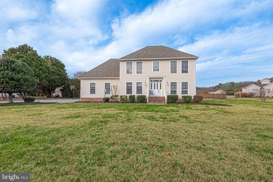 Stunning, spacious Georgian-style home located just 10 minutes from the Ocean City, Delaware beaches and Historic Berlin. Enjoy peaceful rural living while relaxing by your inground pool, all set within a fully fenced one-acre yard.
The home features a Hardie-Plank exterior and a side-entry garage with two new garage doors. Inside, you’ll find elegant crown molding, decorative raised wall paneling, custom built-in bookshelves, and a beautifully appointed kitchen with granite countertops and stainless steel appliances. A new heat pump installed in 2025 adds modern efficiency.
The first-floor office has been converted into a private in-law suite, ideal as a fifth bedroom, complete with an en-suite walk-in bath. Upstairs offers four generously sized bedrooms and two full baths, including a stunning primary bath with a claw-foot soaking tub and custom marble shower.
Additional highlights include a low HOA fee of just $200 annually and NO city taxes—making this exceptional property as practical as it is beautiful.