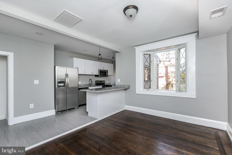 Seller offering $3,000 towards buyers closing costs via DRC and a 1-yr builders warranty! Newly renovated end of group townhome in Saint Helena! All the benefits of an end unit: tons of additional natural light with the extra windows and enjoy a fenced in side yard. Main level contains beautiful refinished hardwoods throughout along with newly installed recessed lighting. The spacious living room leads into the open concept dining room/kitchen. Completely renovated kitchen with granite countertops, new cabinetry, new stainless steal appliances with a large breakfast counter top. Entry to rear of property from kitchen to access private parking. 3 bedrooms upstairs with brand new bathroom finishes including custom tile work. Basement also includes new full bathroom with custom tile, new utilities and a 4th bedroom with egress. Newly finished roof, new carpet, paint throughout! Don't miss this one, won't last long!