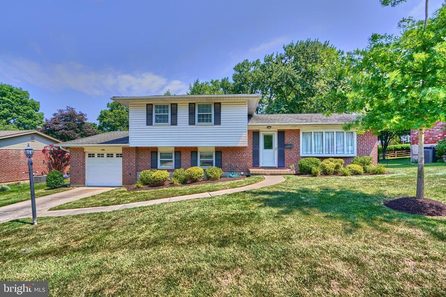 Welcome to Coachford!  Move right in to this 2,100+ square feet split level home, well maintained and gently lived in by its' owner of 30 years.  Enjoy the spacious size of the living room with French doors to the foyer, separate dining room and eat-in kitchen with granite countertops.  The upper level boasts three bedrooms and two full baths.  It is believed that there are hardwood floors under carpet in the primary bedroom.  The cozy lower-level family room includes a brick wall with wood burning fireplace and indoor grill (as-is, current owner never used), wet bar and 17 x 14 addition with vaulted ceilings, recessed lighting and windows galore for loads of natural light! In addition, the lower level boasts a 4th bedroom (with windows and closets) or office, laundry area, powder room and access to the oversized 1-car garage with plenty of storage space for all of your needs.  Relax on the stamped concrete back patio overlooking the perfect .25 acre flat backyard. HVAC - 2023