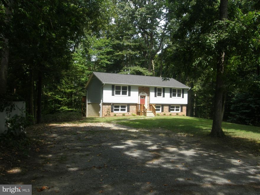 Peacefully situated on private wooded lot in Hollywood this home is ready for you today!!!! Many improvements include new roof with architectural shingle, deck boards replaced, bathrooms updated, most flooring updated, new countertops, sink and faucet, new paint throughout, and yard just landscaped. 
This home is turn key ready no move in improvements needed!!!! 
There is a community pier available for Whiskey Creek properties within walking distance. Do not delay if you are looking for a home to buy this could be you!!!!