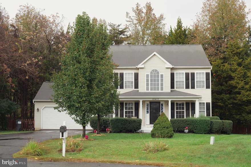 Gorgeous Colonial won't last long!!  This well maintained 4 bedroom home  boasts  a dual sided gas fireplace, family room built in's,  interior columns and open floor plan!  First floor features hard wood flooring with carpeting in the family, dining and living rooms.  Carpeting is neutral for your decorating ease.  Like new appliances in kitchen along with breakfast bar!!  Master-bedroom offers dual walk-in closets & soaker tub with separate shower!  Ideal location on a quiet cul de sac close to commuting, schools and shopping!  All this on a half acre, fenced in wooded lot in popular Lee's Hill! Don't let this one pass you by!