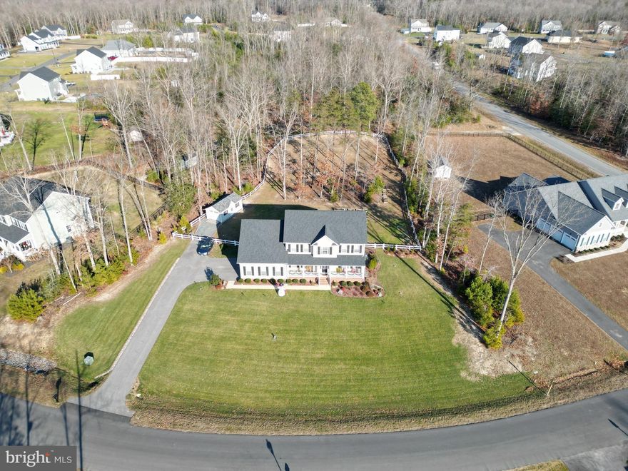 Stunning colonial in sought after Laurel Preserve on 1.29 acres. Plenty of upgrades in this like new home to include a gourmet kitchen with double ovens,  gas cooktop, large island with dining space, upgraded soft close cabinets and drawers and slate stainless steel appliances. 1st floor is spacious and bright and boasts 9 ft ceilings with office/living room, large dining room, breakfast room, kitchen and family room with gas fireplace.  Hardwood floors thru out the first floor. Mud room leads to oversized 2 car garage with a drop zone with custom built in cabinetry to hold it all. Upstairs has 4 bedrooms and separate laundry room. Master suite with luxury bathroom that has  walk in over sized  tiled shower,  separate sinks, soaking tub and vanity area. Crown molding and upgraded lighting fixtures thru out the home.  Basement is unfinished for you to complete as you would like with a 3 piece rough in. Slider in Breakfast nook leads to a deck and a large cleared back yard that is fenced in completely in the rear. Garden area.  Custom built oversized shed.  This home has been maintained very well.