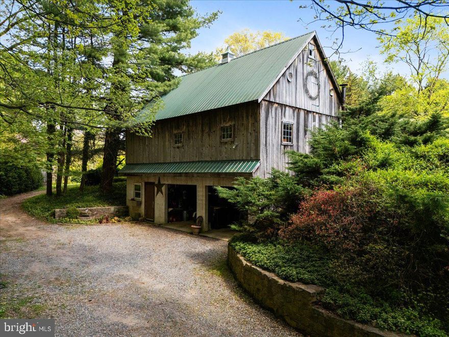 With soil as rich as its history in the Cuttalossa Valley, this 8.7 acre parcel is all about the land and its location on one of the few named Heritage Roads of Solebury Township. With a township file going as far back as 1970, there is a plethora of history and permits detailing construction of the primary residence, meandering driveway up from the Cuttalossa stream, and the two story accessory building. The enjoyment of and appreciation for the land extended over the decades to include an abundant nursery, beautiful flower gardens and bountiful vegetable gardens, and natural resources and materials honed from Cuttalossa Valley stones and incorporated into the home. The current owners describe the property as serene and meditative surrounded by nature on all sides, magical and very private with the sights and sounds of birds, stream, and wildlife providing inspiration during every season throughout the year. Having a deep appreciation for the many surrounding parcels that are in land preservation, the owners seek a steward who will honor the land and wish to invest in a home and accessory building that will be sold "As Is" and accept the property in its current condition. Located on one of the MOST desired roads in all of Bucks County, area residents enjoy its preferential destination, reasonable tax rate, and highly regarded public and private schools. As well, the historic downtown area of New Hope is rated as one of the top attractions unto itself located on the banks of the Delaware River and Historic Delaware Canal. The property ideally presents itself within a gracious country setting with a lifestyle many seek, yet it is also very convenient to the necessities of New York City, Princeton, and Philadelphia. It's time to make fabulous Bucks County home, not just for a weekend but for a lifetime.