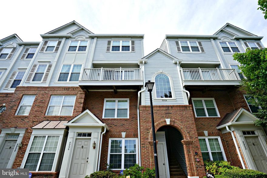 New granite in kitchen * New carpet & pad on the main level * Master bath updated * Bright  & open floorplan backing to trees  * 2 Brs, 2.5 Bas * Kitchen w new flooring & stainless appls * Living room w gas fireplace * Fresh paint on the main level * Balcony * Newer windows * Master bath w sep tub & shower * Walk to Metro, close to shopping, restaurants, Old Town & commuter routes