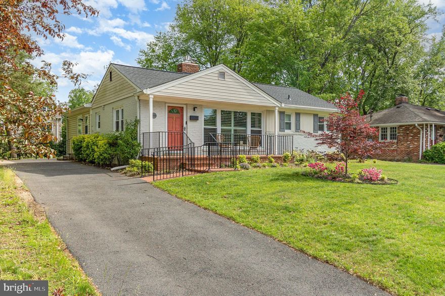 A lovely rambler in Alexandria’s popular Hollin Hall Village. This home has been completely updated from top to bottom with over $100,000 in modern touches just a few years ago. Highlights include a new roof in 2022,  HVAC 2023, newly updated bathrooms, custom surround-sound system, and new ceiling fans. The home has hardwood floors, recessed lighting, and an amazing amount of natural light streaming in everywhere and even has gas fireplace in the living room. The  re-imagined kitchen features modern cabinets with under-cabinet lighting installed in 2022, quartz counters, stainless Miele appliances, a built-in coffee maker, stylish tile backsplash and an overhang for bar stool seating. The second family room has vaulted ceilings, a very large window, and a door that steps out to the Trex deck. The nicely landscaped rear grounds are bordered by a new fence, a built in raised garden, large privacy trees, and beautiful flowers.  The owner’s bedroom has a cathedral ceiling and built-ins in the walk-in closet with a beautifully updated bathroom.  The second and third bedrooms share a hall bath with beautiful finishes. A large laundry and storage room furnished off the home.