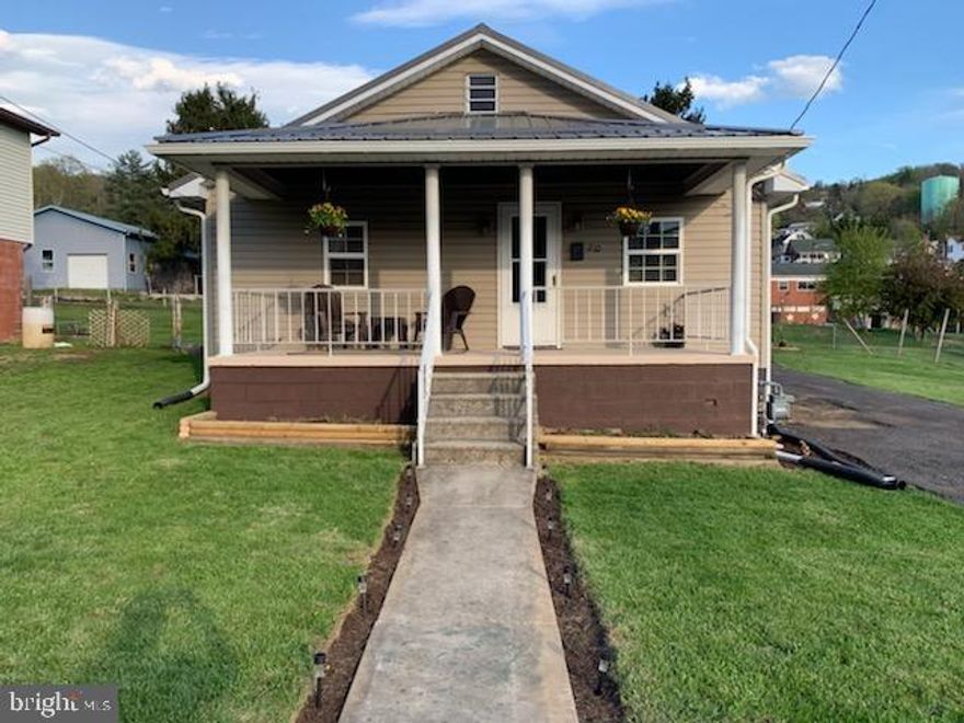 Nicely maintained 2 bedroom rental. Large eat-in kitchen with gas stove and refrigerator. Large Living room with laminate flooring. Washer/dryer hook-up on main level.  Partially fenced yard. Off street parking.