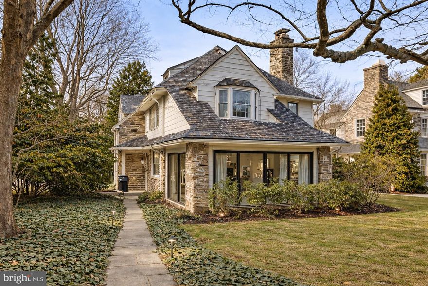 13 E Newfield is an exceptional 4 bedroom, 3.5 bath single family home set on a quiet, tree-lined street in highly desirable Bala Cynwyd within the award-winning Lower Merion School District.  During their ownership, the current sellers invested over $100,000 in meaningful improvements, including a full house electrical rewire, new roof in 2023, refinished hardwood flooring, system upgrades, and exterior enhancements that elevate both functionality and curb appeal. A classic center hall layout opens to a gracious living room with built in cabinetry, a formal dining room, and a well-appointed kitchen featuring granite countertops, double ovens, a 5 burner induction cooktop, abundant cabinetry, and an adjoining breakfast area. A spacious family room provides outstanding flexibility for entertaining, media space, or everyday living. A standout feature of the home is the sun-filled front conservatory complete with heated floors, a gas fireplace, and custom built ins, an ideal setting for a sitting room, private office, or year-round retreat. On the second level, the primary suite offers vaulted ceilings, a sitting area, and an updated en-suite bath with soaking tub and separate shower. Two additional bedrooms and a full hall bath complete this level. A private upper-level suite includes a fourth bedroom, full bath, and walk-in closet perfect for guests, extended family, or work-from-home flexibility. Outdoor living is equally inviting with a flagstone patio and professionally installed landscape lighting that enhances the home’s evening presence. A fenced yard with locking gates with a stunning Kousa dogwood and native plants that are lush and thriving designed to create your own natural sanctuary. A private driveway accommodates four vehicles and leads to a detached 2-car garage a valuable amenity in this walkable neighborhood. Located just minutes from the Cynwyd SEPTA Regional Rail station with convenient access to Center City Philadelphia, and close to the Cynwyd Heritage Trail, Bala Cynwyd Park, and the shops and dining along City Avenue and downtown Bala. Easy access to I-76 and the Main Line makes commuting seamless. A rare opportunity to own a substantial Bala Cynwyd single home combining space, investment-quality improvements, and exceptional walkability.