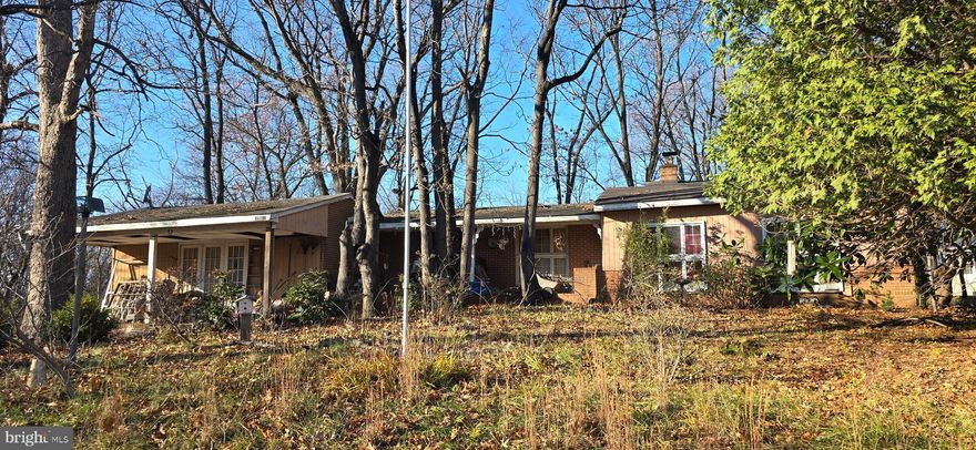 Great Investment Property! Nice Views! Property has been vacant for 4 years with utilities turned off.  Sold strictly AS IS.  Rehab property.