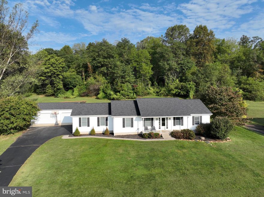 Let Rising Sun welcome you with this cozy rancher situated on a peaceful and quiet street where families thrive together. This home has been kept in immaculate condition, sitting on .9 acres and backing to nearly 30 acres of open space that will become your playground. Purchase of this home allows the use of the open space property directly behind this property, which has been very productive for hunting for the seller. Featuring an open floor-plan, 3 bedrooms, 2 full bathrooms, and a finished basement this home is perfect for a family. As an added bonus, you will be enjoying the inground pool and large deck on those hot summer days, and during the spring and fall use the detached 3-car garage for other outdoor recreational activities. The attic to the home is located in the 2-car attached garage, along with another entrance to the home. 

The basement of the home was completely waterproofed before being finished off. You will find ALOT of space down there, new finished floors, a large wall-mounted TV, a bonus room (use for home office or additional bedroom), and a large unfinished utility room. The gun safe in the bonus room does convey with the sale of the  property. A small freezer in the basement storage closest will convey. 

To note, the roof, pool liner and deck are only two years old, and there was new septic system installed 3 years ago. This is a beautiful home that is move in ready. Schedule your private tour today!