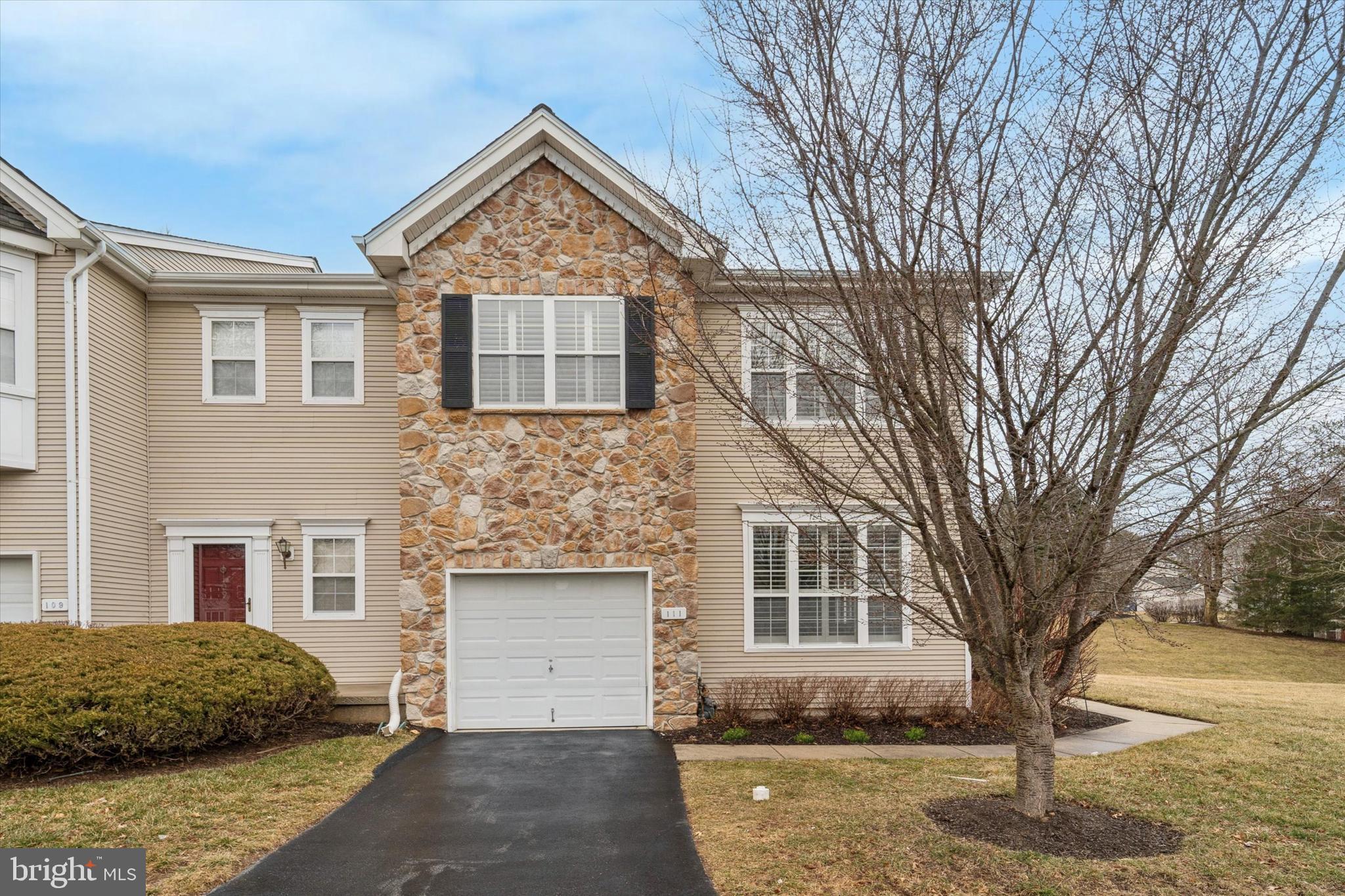 Stylish and well-appointed three-bedroom, two-and-a-half-bath end unit townhome in the highly sought-after Brandywine at Thornbury community in West Chester. Located within the top-rated West Chester Area School District, this home is situated on a quiet street, it offers modern updates, an open layout, and access to fantastic community amenities.
Upon entering, you'll be greeted by a bright and spacious floor plan, gorgeous wide plank white oak hardwood floors, soaring ceilings, and abundant natural light. The formal living and dining areas provide an elegant space for entertaining, while the family room with its cozy gas fireplace, vaulted ceilings, and oversized windows, creates a warm and inviting space.
The kitchen features granite counters and a marble backsplash and is open to the family room offering seamless entertaining, with a breakfast bar that seats three. A sliding glass door leads to a private paver patio, providing a serene outdoor space with scenic wooded views, ideal for morning coffee or evening relaxation. The powder room features a custom vanity and sink, and two storage closets provide ample storage.
The Primary suite is a peaceful retreat with vaulted ceilings, two spacious custom outfitted walk-in closets, and an en-suite bath featuring a soaking tub, dual vanity, linen closet and a walk-in shower. Two additional generously sized bedrooms and a hall bath with vanity and tub/shower combination are perfect for family or guests. The second-floor laundry room, complete with a utility sink and cabinetry, adds everyday convenience.
The full, unfinished basement offers abundant storage and endless possibilities for customization. This home is freshly painted with new carpets throughout and features updated lighting fixtures, a new roof, new hot water heater, and is move-in ready! An attached garage, private driveway, and ample guest parking mean never worrying about parking.
Brandywine at Thornbury’s low HOA fees include outstanding community amenities, a swimming pool, dog park, walking trails, playground, tennis, pickleball and basketball court are all a part of this fabulous community! .
Conveniently located between downtown West Chester and Wilmington, this home offers suburban living with easy access to shopping, dining, major highways, and everything Chester County has to offer.
Don’t miss this incredible opportunity—schedule your private tour today!
