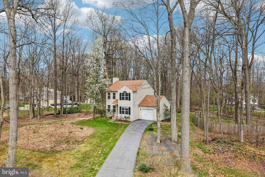 Escape to your own private oasis at 106 Debbie Drive, Coatesville! Nestled on a sprawling 1-acre partially wooded lot in West Caln Township, this charming 3-bedroom Colonial offers the perfect blend of tranquility and convenience. Nature enthusiasts will love being just moments away from the Sadsbury Woods Preserve, boasting 500 acres of protected woodlands and 6 miles of scenic walking trails. Inside, enjoy a spacious, light filled open floor plan which includes a family room with a cozy wood-burning fireplace, a formal dining room with elegant wainscoting, and a kitchen equipped with a stainless steel Bosch dishwasher and a new refrigerator. The main level also includes a dedicated office/flex room, a half bath as well as access to a 1-car garage. On the upper level you will find a primary bedroom with ensuite bathroom as well as 2 additional bedrooms, a convenient laundry area, and a full bathroom in the hall. The spacious unfinished basement offers a clean slate for future living space. Relax on the rear deck and take in the peaceful views of your wooded backyard.  Recent improvements to the home include new HVAC unit (2026), new driveway, new Pella patio door (2025), new roof and beautiful hardwood flooring installed throughout the home (2021). Enjoy peace of mind with  the whole house generator! This is a fabulous home in a wonderful location. Book your appointment today!