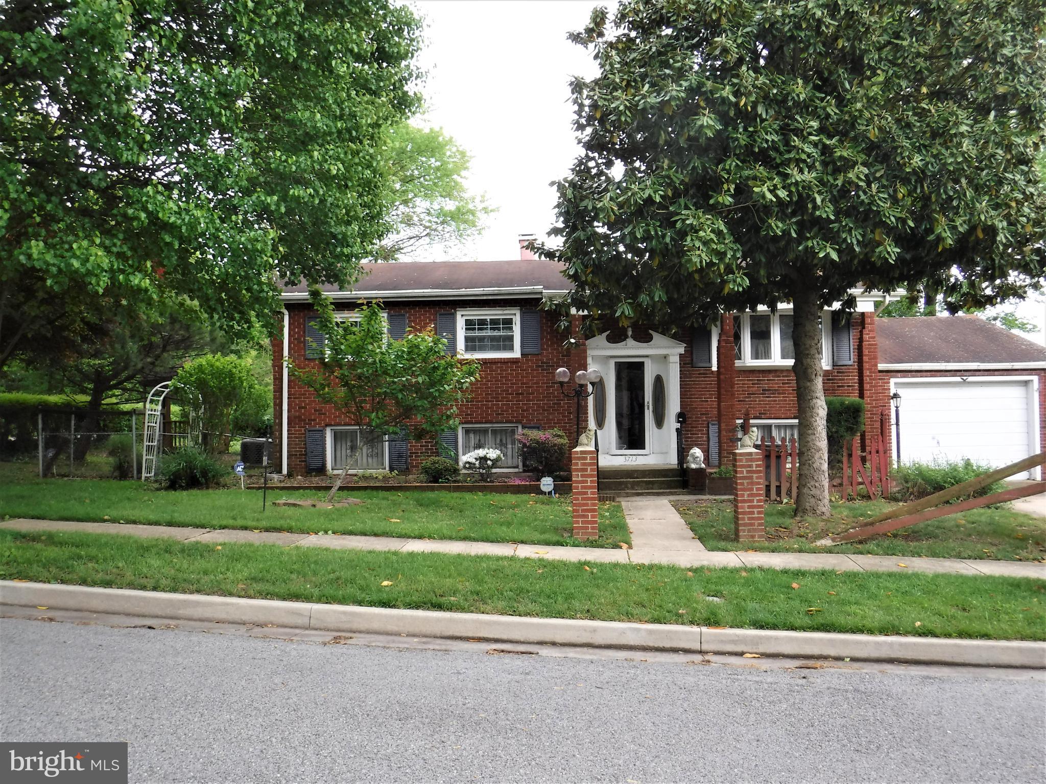 Come see this Large Home on a Big Corner Lot! 3 Bedrooms & 1 1/2 Bathrooms, Large Kitchen with lots of cabinets & counter space, All Appliances Convey, Dining room with beautiful Tiffany light, Big Living Room with bow window & brick fireplace with wood stove insert! French doors from Dining Room to Bonus Room with lots of windows and door to deck. Foyer has slate flooring & ceiling fan with Tiffany light. Lower level has 1/2 bathroom, family room with built in bar, utility room with Trane furnace & Central Air (2021), 2 sump pumps, laundry area with gas dryer & washer w/laundry sink. Wonderful Corner Lot with Gazebo, shed, brick barbeque, trees & private setting. This property is being conveyed in "As Is" condition. Sellers are providing 1 year First American Home Warranty for Buyer(s) at settlement.
