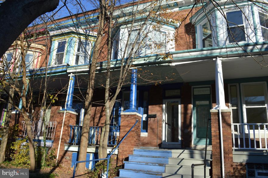 This is a Short Sale.  Get representation with a realtor.  Classic porchfront home, one block from Union Memorial Hosp and 4 blocks from Johns Hopkins University on Charles St.  Wood flooring, exposed brick,  a beautiful mantel in the living room, updated kitchen with exit to rear yard.  Three bedrooms and bath on the second floor, all separated by a hallway.  Basement was finished to include a recreation room and a second full bath.  Appliances in the kitchen and washer/dryer in the basement, all stay with the home.  Gas fired heating system and water heater.  Updated electrical breaker box.