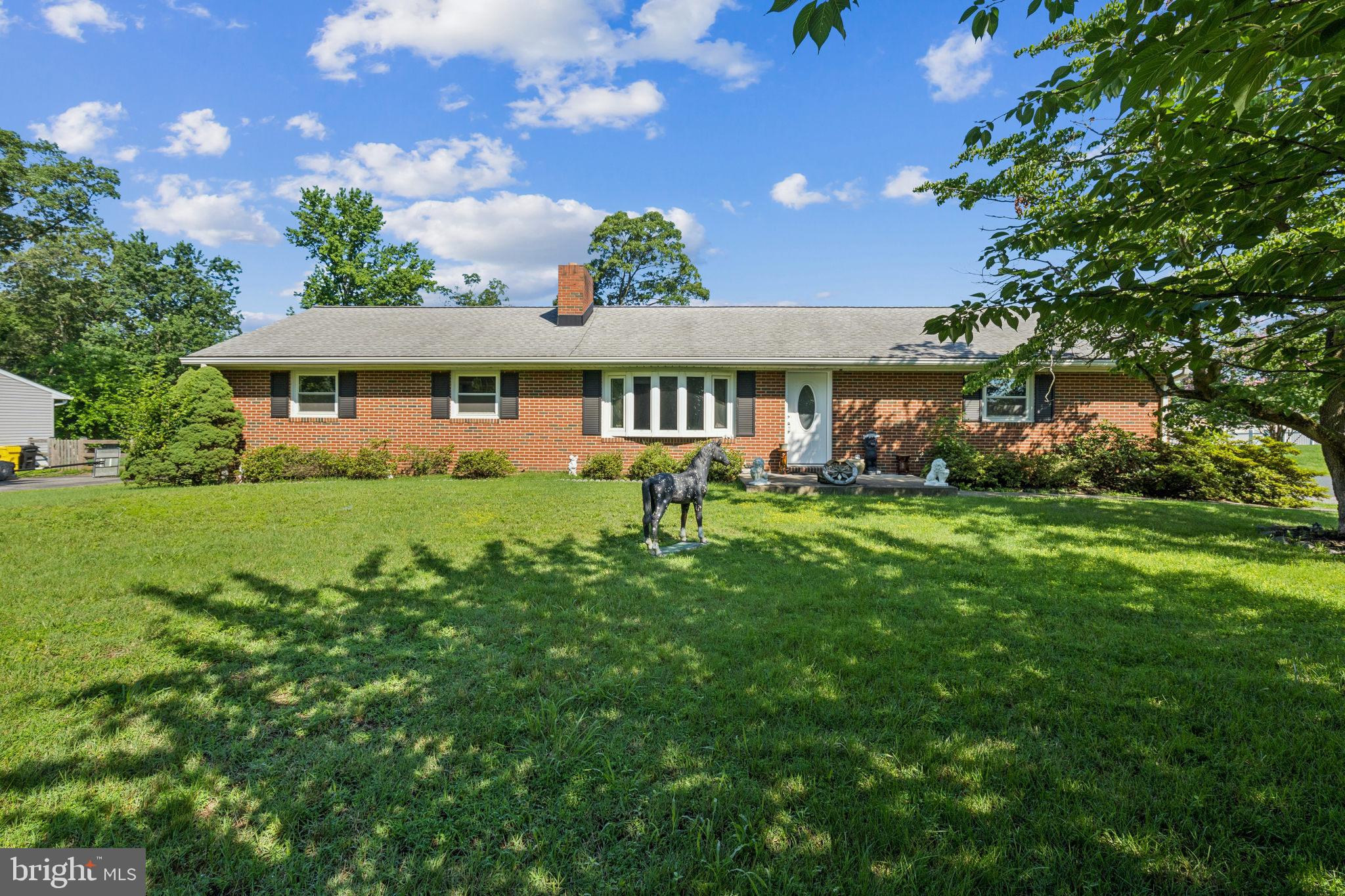 This meticulously renovated 3-bedroom, 3-bathroom, 2-car garage all-brick rancher has over 2,000 sq ft that was planned with total functionality and modern elegance. You'll see and love all the attention to detail, including elegant crown molding throughout both levels. Inside, the interiors have been meticulously renovated with custom trim work and exquisite finishes. As you you step inside, you are welcomed by a formal living room adorned with a cozy wood burning fireplace with mantle, retractable bay window and recessed lighting. The kitchen has all-new cabinets with soft close drawers, granite countertops with peninsula for eat-in space and stainless-steel appliances. The dining room is just off the kitchen and has built-in shelving. The main level also has 3 great-size bedrooms and a full bathroom with dual vanity, granite counter tops and shower/tub. The lower level is finished with windows and highlighted with a spacious and well-lit family room, the second wood burning fireplace w/ brick wall, mantle and built-ins, recessed lighting, full bathroom, large opt 4th bedroom/den/game room that is adjacent to the finished laundry room with hook-ups. LVP runs flooring throughout the entire house. The backyard is a private retreat, featuring a screen-ed in patio with 12' ceilings. Take the exterior staircase up and take in the spectacular views from your very own roof-top deck! The deck overlooks the amazing resort style outdoors that is fully fenced-in and showcases an in-ground gunite pool with concrete decking that provides plenty of space for lounging. Pool house with full bathroom, a covered patio, custom brick knee wall and 2 additional storage sheds. The house has 2 electrical panels. Just around the corner from the new Severn Run High School and Spalding High School. Close proximity to restaurants and major highways. This is a rare opportunity in such a desirable neighborhood, so schedule your own private tour today!
The 3rd full bathroom is the pool house.