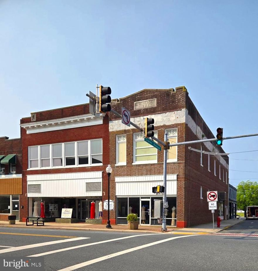 Located in the heart of a downtown commercial district, the ground-floor retail space boasts large storefront windows, excellent signage opportunities, and a wonderful corner location. The building/s offer some beautiful architectural features like a metal ceiling that is in very good condition. The interior is bright and open, ready to accommodate your next venture.  It may be a great candidate for a restaurant, café, salon, or office or other business that could benefit by the well located site and the very spacious building.  There may also be the potential for residential loft units on the second floor.  This property offers the opportunity for a creative Buyer to buy a very large space at a very reasonable price per square foot!  Buyer's should verify any desired use with the City of Pocomoke as well as the square footage which was taken from the tax records.