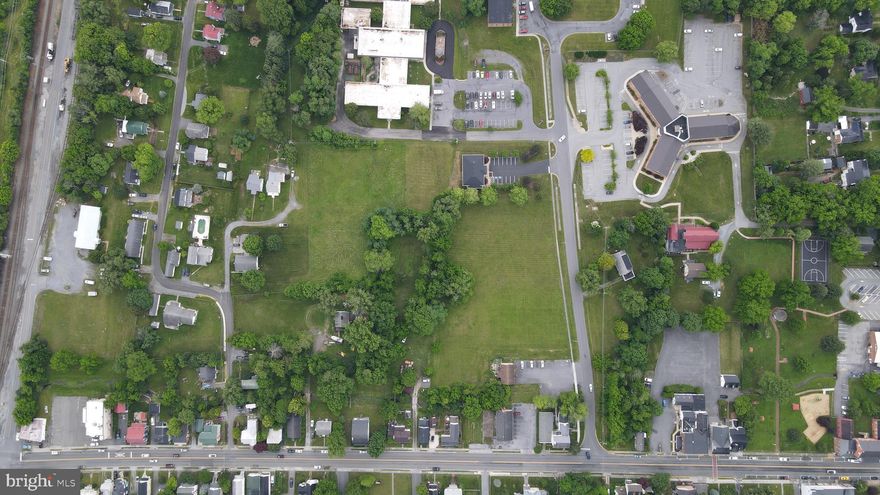 Prime development opportunity in the heart of Berryville! These 6 contiguous lots, totaling 1.47 acres and zoned R2, are perfectly situated across from the Berryville town offices. Whether you’re looking to build residential properties or seeking an ideal location for commercial space, these lots offer incredible potential. All utilities are readily available. Don’t miss out on this rare opportunity in a highly desirable location.