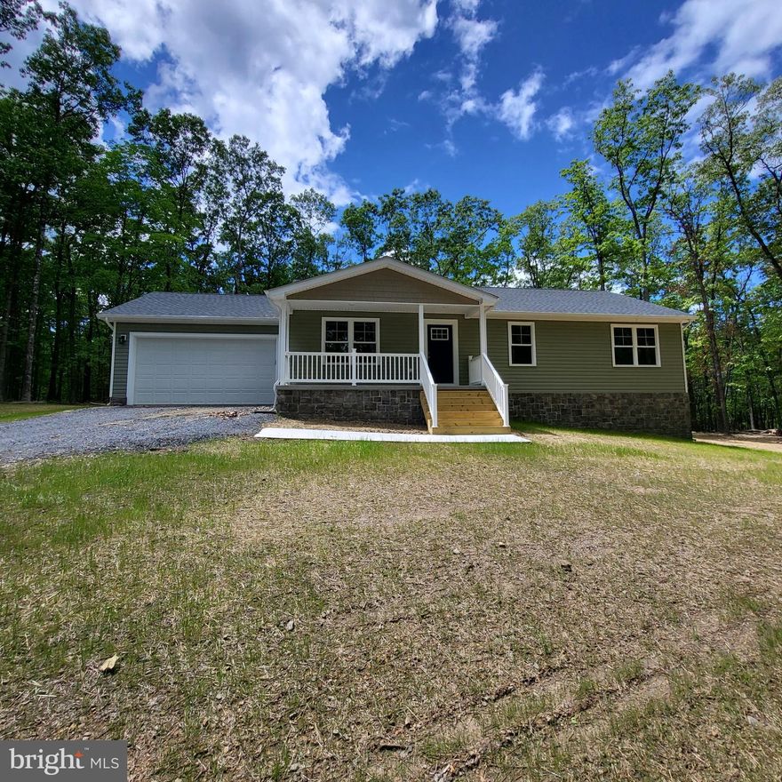 Another beautiful new construction home from JTM Builders.  Situated on a perfect 2 acre lot, you wont be disappointed with the attention to detail the builder has put into upgrading this home. Featuring an open layout with modern kitchen including granite countertops and stainless steel appliances. Home features extra durable LVP flooring throughout the main living areas. There are 3 large bedrooms with carpet and 2 bathrooms with LVT floors. Master bath features a 5 piece master bath with Tiled shower. This one level living can also be expanded as you have a unfinished basement with a rough in for future bathroom already done for you. Outside you will find a private retreat and a 12x16 deck to enjoy those barbeques. Pictures of  same model completed. Home complete in august. Put in offer today!