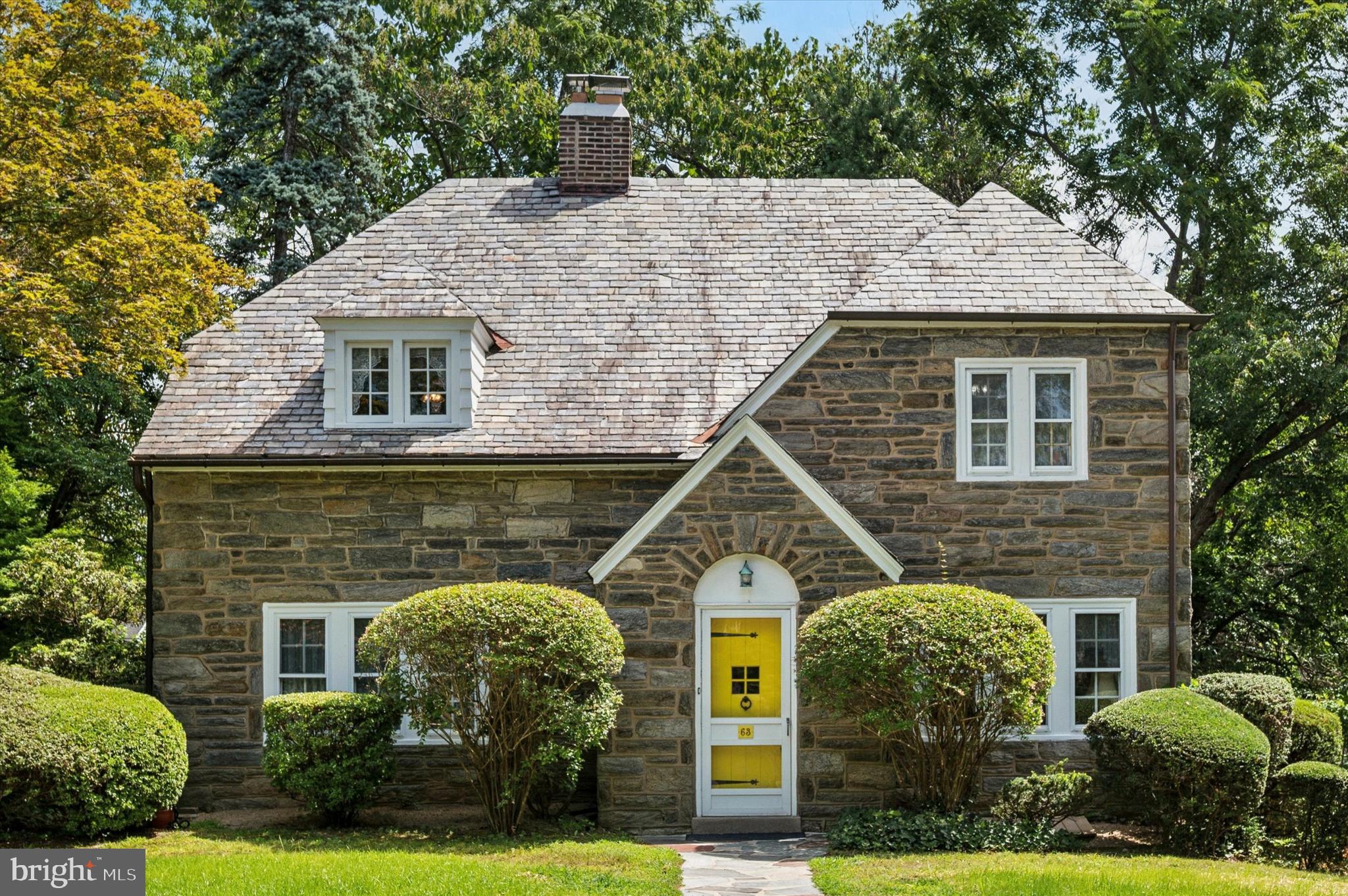 Welcome to 63 South Hillcrest Road – Where Timeless Style Meets Everyday Comfort
Nestled in one of Springfield’s most desirable neighborhoods, this charming Tudor-style home offers a rare blend of character, comfort, and convenience. Set on a quiet, tree-lined street, this beautifully maintained 3-bedroom, 1.5-bath home has everything you need—whether you're settling into your first home or looking for a place to grow your family.
From the moment you pull up, you'll be captivated by the curb appeal—with its classic Tudor rooflines and beautifully manicured landscaping that immediately sets the tone for what’s inside.
As you step through the front door, you’re greeted by a welcoming foyer, featuring a wide staircase. Every room in this home is thoughtfully laid out and filled with natural light, offering the perfect balance of old-world charm and modern functionality. Hardwood floors flow throughout the main level, adding warmth and character. A bright family room/den sits just off the foyer, ideal for a cozy sitting area, home office, or playroom. A convenient powder room is discreetly tucked away—perfect when entertaining. The living room is cozy, complete with a brick fireplace, large windows, and room for all your favorite furniture. Adjacent to the living area is a formal dining room with plenty of space for entertaining guests, family dinners, or hosting during the holidays. The kitchen offers the perfect canvas for both functionality and style, with a layout that’s efficient and ready for your personal touches.
Upstairs, you’ll find three generously sized bedrooms, each with ample closet space, classic trim details, and tons of natural light. Whether you need room for family, guests, or a home office, this upper level offers flexibility and comfort. The large full bathroom features classic tile flooring and a walk-in tiled shower.
And just wait until you see the outdoor space as you step through the French doors off the dining room and onto the covered brick patio—perfect for morning coffee, weekend BBQs, or quiet evenings. The backyard provides privacy and peace, making it great for kids, pets, or simply enjoying your own space. Mature trees and lush landscaping surround the yard, creating a serene and shaded outdoor environment. A stone fireplace adds charm and functionality—ideal for cool evenings or entertaining well into the fall.
Parking is never an issue here. A long private driveway offers room for multiple vehicles. The detached two-car garage provides secure parking and additional storage.
This home is a short, walkable distance to restaurants, shops, and top-rated schools. Nearby parks and green spaces provide opportunities for recreation and enjoying the outdoors. Shopping, grocery stores, and all your daily essentials are just a short drive away.
Whether you're heading to work, running errands, or enjoying a weekend out, you'll love how convenient yet tucked away this home truly is.
With its timeless architecture, thoughtful layout, and peaceful setting, 63 South Hillcrest Road is the kind of home that doesn’t come around often. It’s been lovingly maintained and is ready for its next chapter. Don’t wait—schedule your private showing today and come see all the charm, space, and potential this beautiful home has to offer!