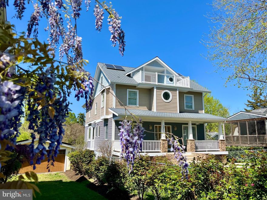 Welcome to this masterpiece of living where timeless architectural elegance meets the sophistication of modern luxury. This extraordinary custom-crafted Craftsman home, completed in 2008 with impeccable attention to detail, offers over 3,500 square feet of exquisitely finished living space, along with an additional 575 square feet in a high-ceilinged lower level—ready to be transformed into your bespoke wine cellar, home theater, or wellness retreat.

Discreetly positioned with rear alley access, the expansive three-car garage preserves the graceful charm of the home’s façade, while a private residential elevator effortlessly connects all levels, offering both refined convenience and multigenerational versatility.

Inside, natural light pours through expansive windows, illuminating a seamless open layout that blends formal sophistication with casual elegance. The grand living room, formal dining space, and inviting family room are designed for both intimate gatherings and effortless entertaining. A versatile main-level suite with en-suite bath and walk-in shower adds flexibility, ideal for hosting guests or creating a private office or library.

The heart of the home—a culinary sanctuary—features a designer chef’s kitchen appointed with premium finishes and top-tier appliances. Dual stainless steel sinks, including one with a custom integrated drainboard, are paired with Insinkerator disposals. Two French-door refrigerators with ice makers, a five-burner gas range with griddle, warming oven, generous prep surfaces, and under-cabinet lighting all contribute to a space where functionality and artistry coexist. Frank Lloyd Wright-inspired casement windows add an architectural flourish, enhancing the room’s ambiance.

Ascend to the upper level where the luxurious primary suite offers a private sanctuary, complete with a spacious walk-in closet and a spa-caliber en-suite bath. Three additional bedrooms—each generously sized—share a stylish Jack and Jill bath, combining comfort with convenience. The finished attic provides a flexible living space, featuring built-in shelving, hidden storage, and a walk-out balcony that adds 195 square feet of tranquil outdoor living.

This residence is a true testament to quality and foresight, featuring enhanced sound insulation between floors and bedrooms, solar panels with Dominion Energy green certification, and state-of-the-art wiring, including CAT5, coaxial cable, and quad outlets in key rooms—ensuring seamless connectivity and energy efficiency.

Crafted with enduring quality and curated for modern luxury living, this exceptional home offers an unrivaled blend of classic design, intelligent features, and serene comfort. From the moment you arrive, you’ll know—you’ve found something truly special.