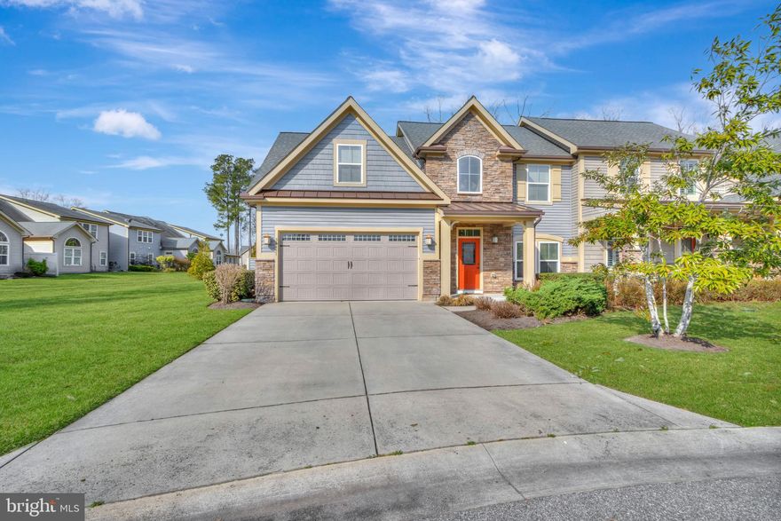 Charming Ashford Villa backs to protected woodland in Forest Landing just minutes from Bethany Beach. This lovely 4 bedroom, 2.5 bathroom home has 2750 sq ft of living space. Open floor plan with vaulted ceilings, gas fireplace and upgraded wood flooring throughout the first floor and stairs. The kitchen comes with granite countertops, stainless steel appliances and kitchen nook for those delicious dinner parties. The sunroom leads to a large private paver patio ideal for outdoor entertaining. Entry level primary suite with walk-in closet and vibrant ensuite bathroom has dual vanities and tiled shower. Still on the first floor are the half bath and laundry room. Beautiful wood handrails with intricate wrought iron balusters adorn the staircase and loft. On the second floor you find three bedrooms, a full bath, a walk-in storage room and a loft area for that cozy reading nook or office alcove. The original owners enjoyed it as a second home and have lovingly cared for it thus the fantastic condition. Numerous items were upgraded and or added such as high end ceiling fans, bath tiles, flooring, built-in cabinets in the laundry room, insulated the garage door, put in ceiling shelving, epoxy flooring & drywalled/painted the two-car garage, crown molding and chair rail in kitchen nook, garbage pail enclosure attached to the house and alarm system installed. Low maintenance living with lawn & shrubbery care, irrigation, gutter cleaning, power washing and house trim repainted included in the HOA. Amenity rich with community clubhouse, outdoor pool, pickleball, tot lot playground, fitness center and walking trails. Plus, numerous community events: happy hours, summer parties, group dinners, etc. Schedule your tour today!