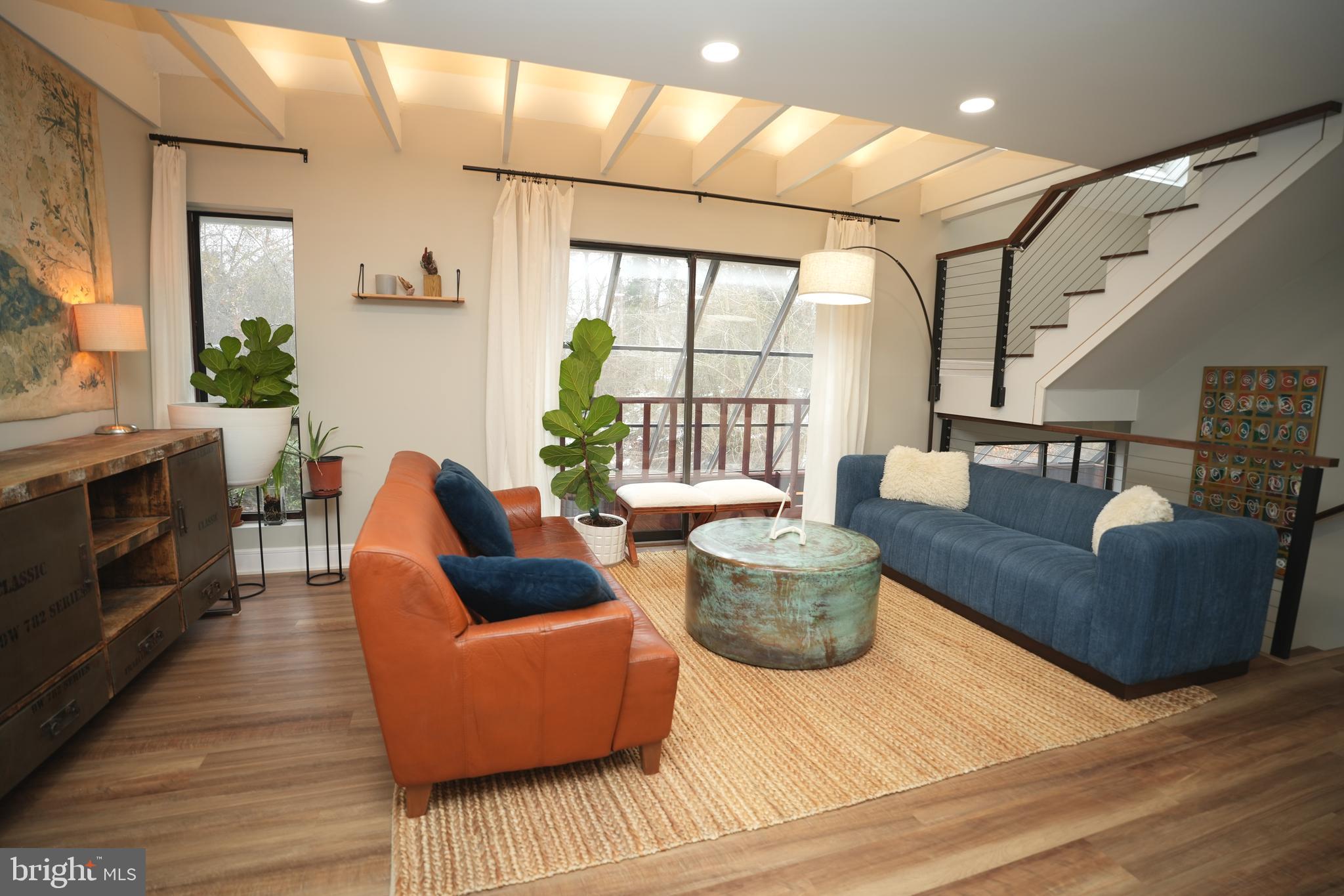 Custom passive solar home designed for energy efficiency and comfort. This thoughtfully updated home features a newly remodeled kitchen with new cabinets, countertops, and appliances, plus LVT flooring throughout. The primary and half baths have been completely renovated.
An open floor plan enhances natural light, with a solarium featuring a tiled floor. Additional highlights include a 2-year-old roof, an oversized two-car garage with second-story storage, and a private backyard. Located on a quiet cul-de-sac, just a short walk to the neighborhood beach, pier, and picnic gazebo.