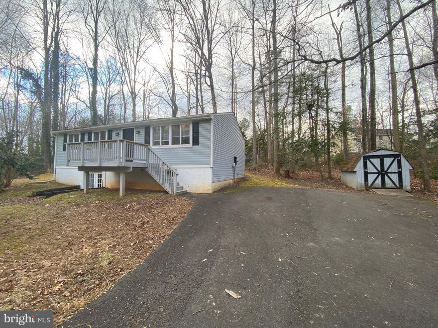 Experience the comfort and convenience of this spacious 4-bedroom, 2-bath single-family home, thoughtfully designed with an open floor plan that allows for seamless living. The well-appointed kitchen offers plenty of cabinet space and a sliding door leading to the patio, perfect for entertaining or enjoying outdoor moments. The inviting living room is highlighted by a skylight that fills the space with natural light, creating a bright and airy atmosphere.

The home features three bedrooms, each with cozy carpet flooring and ample closet space. Downstairs, you'll find a dedicated storage and laundry area, along with a bonus room ideal for an office or creative space. The lower level also includes an additional bedroom with its own bathroom and a walk-in closet, providing privacy and versatility for guests or extended family.

This thoughtfully designed home seamlessly blends functionality with style, creating an ideal space for both relaxation and everyday living. Situated in the gated community of Lake Land'Or, residents enjoy exclusive access to a variety of amenities, including lake activities, a refreshing pool, and more, enhancing the overall living experience. Please note, tenants are responsible for the cost of their gate passes.

*Washer/Dryer hookups available. 

*A one-time $50 fee is required for tenant registration, payable directly to the HOA.

*Photos taken prior to the most recent tenant's occupancy

CREDIT: Good Credit Considered 
PETS: Yes case-by-case. Sorry, No Cats. 
PET FEE: $450/pet non-refundable fee
VOUCHERS: Housing Choice Vouchers accepted 
UTILITIES: Tenant Pays All
APPLICATION FEE: $60 per applicant
SECURITY DEPOSIT: Minimum One month's rent (Please note that in certain cases, a double deposit may be required)
RESIDENT BENEFIT PACKAGE: $25/month
LEASING FEE: $125 One time due with Move-in Funds.