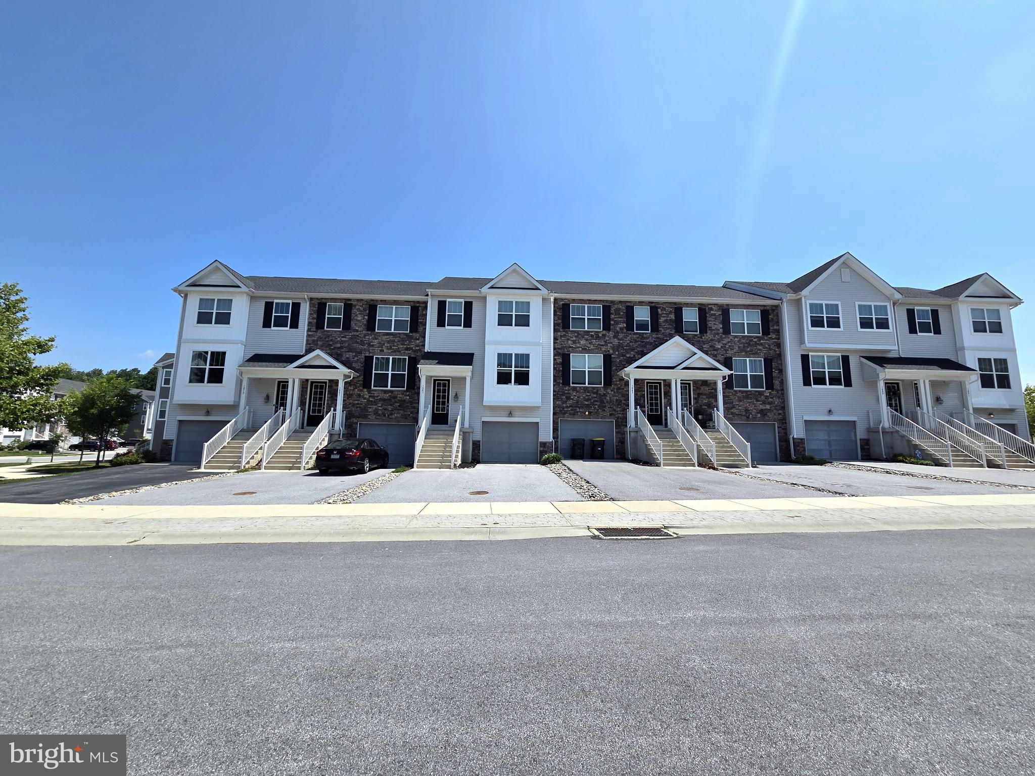 Ready to move in, a newer town home community perfectly situated between Downingtown and West Chester, Minutes away from Thorndale/Paoli Train station with direct trains Philadelphia downtown. Great shopping, dining and entertainment, close to Rt 30, Rt 322 and best of all located in highly acclaimed Downingtown School District. Enter this 3 story town home where you immediately notice the 9ft ceilings and the elongated foyer. As you walk you will notice a 2 story foyer and with engineered hardwood flooring, coat closet and powder room. Take the stairs down to your Rec Room where you can create endless possibilities, family game night, movie theater or just relaxing. It's all up to you! Walk out to your backyard where you can create a patio as well! Take the stairs up where you enter the Kitchen and Great room! All Stainless Steel appliances, Upgraded granite countertops, and Upgraded mahogany soft close gourmet 42" kitchen cabinets, island and granite bar top which can provide great space for working . Walk out to the deck which is perfect for hosting summer barbecues! As you walk up to your third level you will enter your Master bedroom. This room includes a tray ceiling with LED lights and huge windows for natural light! The master bath has 13x13 tile and a sit down bench in the shower; no more standing up!!! This home also includes 2 more bedrooms and a hall bath with more ceramic tile! Lastly, for your convenience, the laundry room is upstairs equipped with washer and dryer. All pictures are of model home and used for representation purposes only.