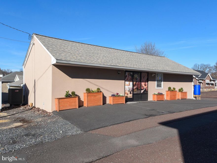 A truly unique investment opportunity, this exceptional mixed-use property combines a charming
red-brick duplex residence with a fully renovated detached 1500+ SF commercial bldg, offering unmatched flexibility, passive income, & prime placement in the heart of the Souderton Historic Business District. With high visibility, walkability, & mixed-use zoning, this property is ideal for investors, entrepreneurs, or owner-occupants looking to live in one unit, lease the other, and generate additional income from a thriving commercial tenant already in place. Owner-occupied first-floor residential unit provides a private side entrance & welcomes you into a warm, sun-filled space featuring 9' ceilings and a spacious family room
anchored by a wood-burning stove, complemented by vaulted wood ceilings, skylights, and recessed lighting. The upgraded eat-in kitchen blends modern style with classic charm, showcasing newer countertops, kitchen island, tile backsplash, updated cabinetry, appliances, ceiling fan, pantry storage, & a beautiful bay window that enhances the room with natural light. The primary bedroom offers wood floors, a ceiling fan, & ample closet space, while the remodeled full bathroom features a sleek tile stall shower. A conveniently located laundry room sits adjacent, providing direct access to the rear yard, and a second nicely sized bedroom also includes a ceiling fan and closet. The yard has raised planter beds for the gardener in the family, a newer storage shed, a woodshed and garden shed. Bsmt access allows for additional storage space. The 2nd residential unit is accessed from the large covered front porch, a perfect place to enjoy morning coffee or relax in the evenings. This unit features 2 bedrooms, 1 full bathroom, a comfortable living area, and a generous eat-in kitchen with a stackable washer and dryer. The main bedroom includes wood
floors, a ceiling fan, and 2 spacious closets, while a stylish barn door leads to the full bathroom complete with a tub/shower combination, & linen closet. An additional flex space on this level lends itself perfectly to a home office, studio, or reading nook. The 3rd level expands the possibilities even further, offering an additional living or office area, a second bedroom, plus an unfinished room ideal for storage. This unit is currently rented at $1,300 per month with a lease in place through 7/31/2026, after which it transitions to month-to-month, providing long- term income stability. The residential tenant pays gas, electric, cable, & internet. The detached commercial building was completely renovated in 2022 and features two separate entrances for added functionality and privacy. The space is currently leased at $1300 per month, with options through Sept 2028 by a thriving Wellness Spa, offering strong appeal for continued business tenancy if desired. Inside, the layout includes luxury vinyl plank flooring throughout, a welcoming lobby area with recessed lighting, 4 private treatment rooms, a walk-in closet for storage or employee use, & an office with an additional sink and bathroom. The large flexible open space allows for a wide range of business, wellness, or professional uses. Includes a new stall shower, and additional conveniences include a hook up for a washer/dryer, (the all-in- one washer/dryer is the tenants) and an assisted wheelchair lift for ADA accessibility. An additional private room is perfect for storage or an office. The commercial tenant pays for gas, electric, cable, & internet. Easy access to Route 309, shopping, restaurants,  breweries, local parks, and the Montgomery and Broad Theaters. With residential and commercial leases already in place and major renovations completed, this property offers rare multi-stream income potential wrapped in timeless historic character—making it an outstanding investment or the perfect live-work-earn setup in one of Souderton's most desirable locations.