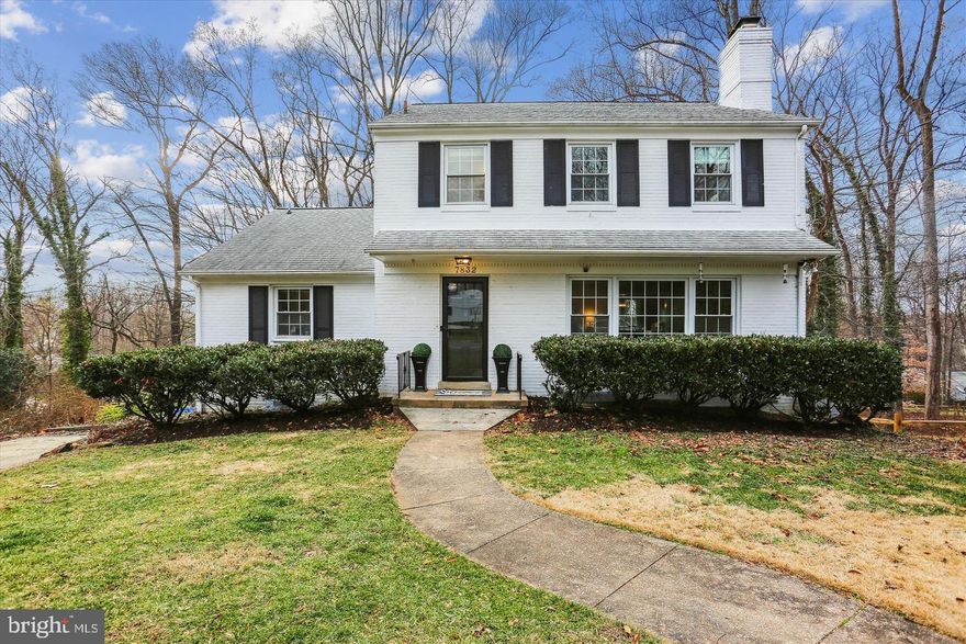 Quintessential and classic Bethesda brick colonial in one of the most sought after school clusters in MoCo. This gorgeous and welcoming home is situated on a quiet cul de sac and offers one of the largest lots in the neighborhood at .46 acres creating a true nature lovers paradise. The home offers modern amenities and a very practical floor plan perfect for any stage of your living needs. This center hall colonial greets you with a spacious entry foyer with convenient coat closet and bench area for getting on those pesky boots. The flow is natural into the expansive living room with wood burning fireplace and oversized windows capturing all the natural Southern facing front exposure. Gorgeous refinished oak floors carry you into the dining room where the views are exceptional overlooking the rear preserve. The designer chandelier tastefully compliments the updated paint job throughout. The kitchen is lovely; featuring a Jenn Air appliance package, marble counters, 42" wall cabinets and custom drawers (dove tail/soft close) with an eat in area for convenient meal time (and bench storage). Wrapping around the Western exposure of the home, you'll find a sun drenched sunroom offering side egress and also a wonderful place to relax with family and friends. The Sunroom connects back to the office/bedroom (located off the main foyer) with closet and a tastefully curated powder room. The upper level offers hardwood floors throughout, three spacious bedrooms (all with overhead lighting) and two renovated bathrooms. There is also a pull down attic with floored space for ample storage. Continuing to the lower level, you will find a large recreation space (above grade) with rear egress and full size windows. There is a large storage room off the mechanical area along with a massive gym/laundry area that could very easily be converted into another bedroom with direct egress to the back of the home as well. There is a fully renovated powder room with a large closet next to the bathroom making an expansion to a full bathroom suite an easy conversion and a huge value add opportunity! Almost every room of this pretty house offer amazing vistas as you are perched atop your own private sanctuary. Observe the deer while you drink your morning coffee and take a nature hike in your own back yard! Or, get creative and make the grounds a truly spectacular transformation into your dream landscape architecture project. The only limit is your imagination. Walking distance to Burning Tree ES AND Pyle MS. This is truly a unique and rare opportunity! Welcome Home.