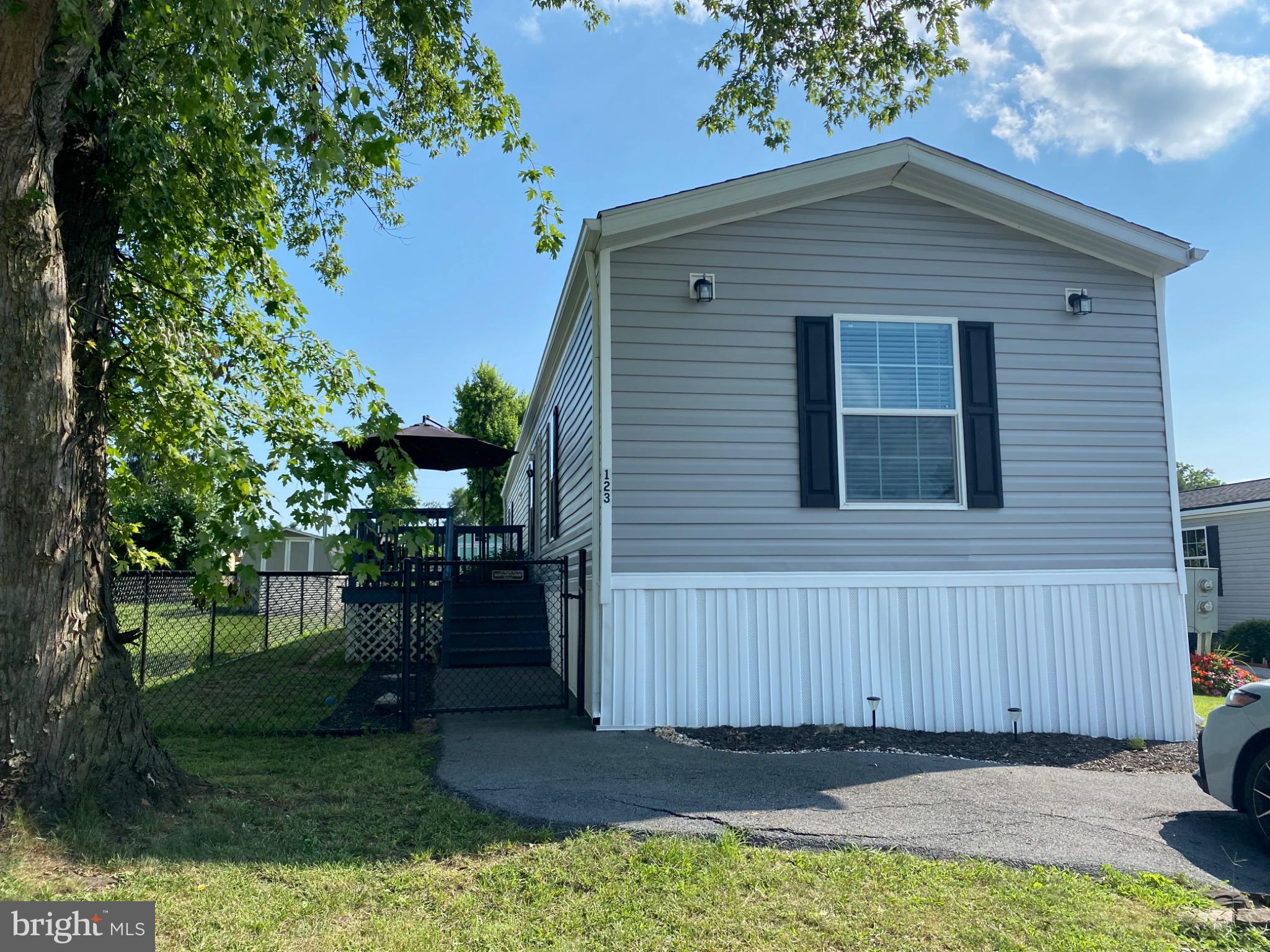 Discover the charm of this beautifully maintained 3-bedroom, 2-bathroom manufactured home in the welcoming community of Whitestone Estates. Built in 2020, this traditional-style residence features modern appliances, including a dishwasher, refrigerator, stove, washer, and dryer, ensuring convenience and comfort for everyday living. Brand new LVP flooring, freshly painted and heat pump is just 2 years old! Enjoy the spacious deck, perfect for relaxing or entertaining, and a handy shed for extra storage. Nestled in a convenient neighborhood, residents are close to nearby shopping, schools with easy access to I81 for quick commute to Winchester and Hagerstown. This property is a perfect blend of comfort and convenience, waiting for you to make it your own! Must be Park approved.